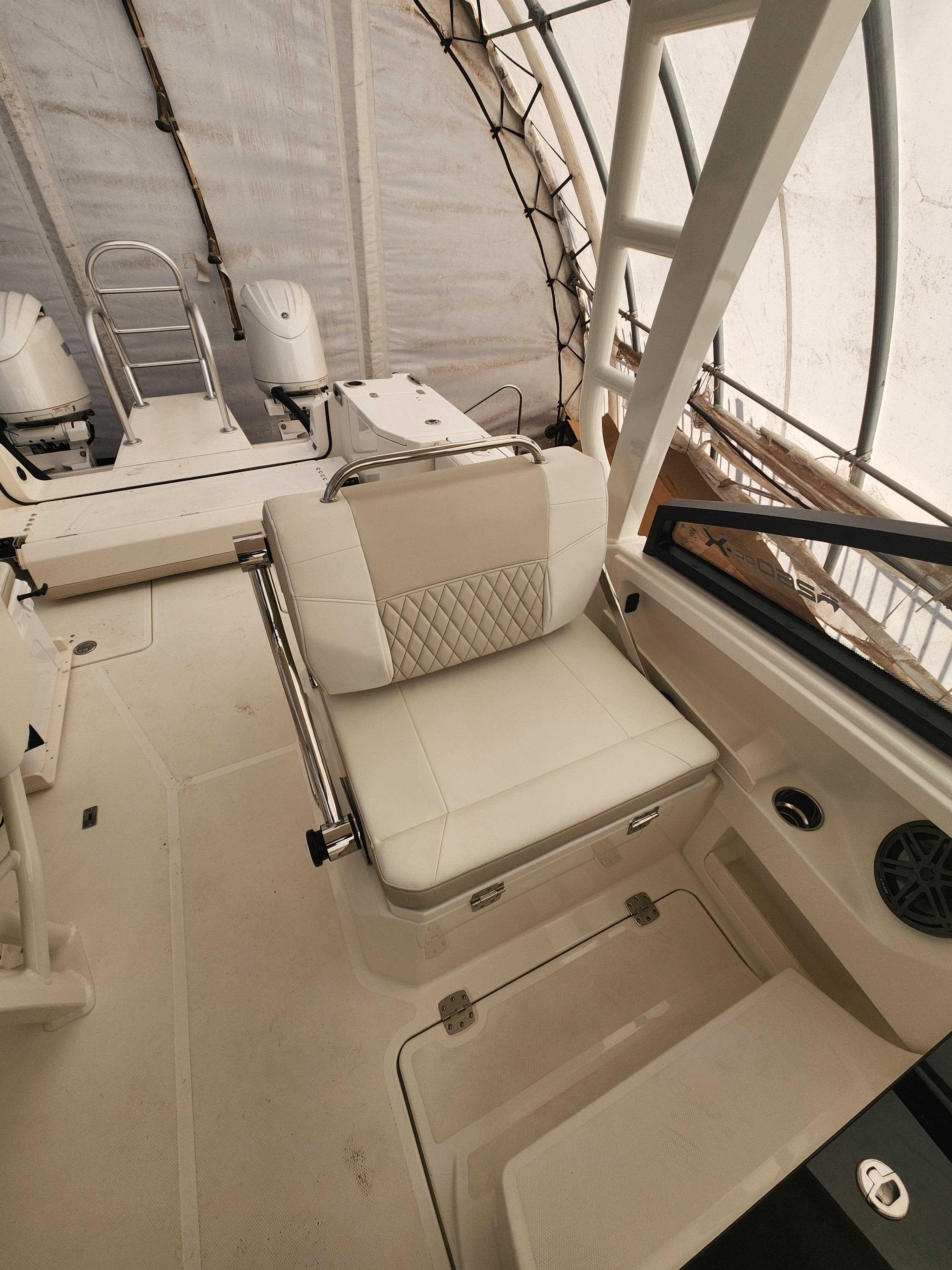 2025 World Cat 260 DC-X boat interior with cushioned seating and modern design.