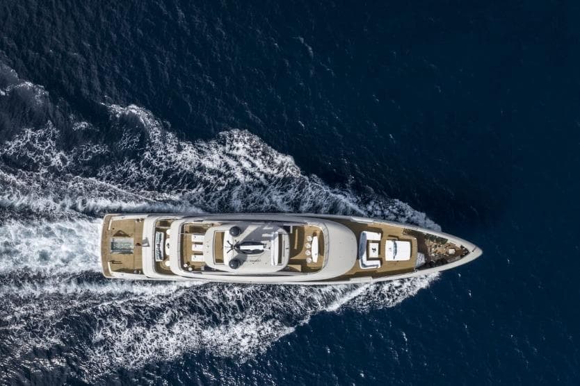 Aerial view of 2021 Benetti B.NOW 50M yacht cruising on open sea.