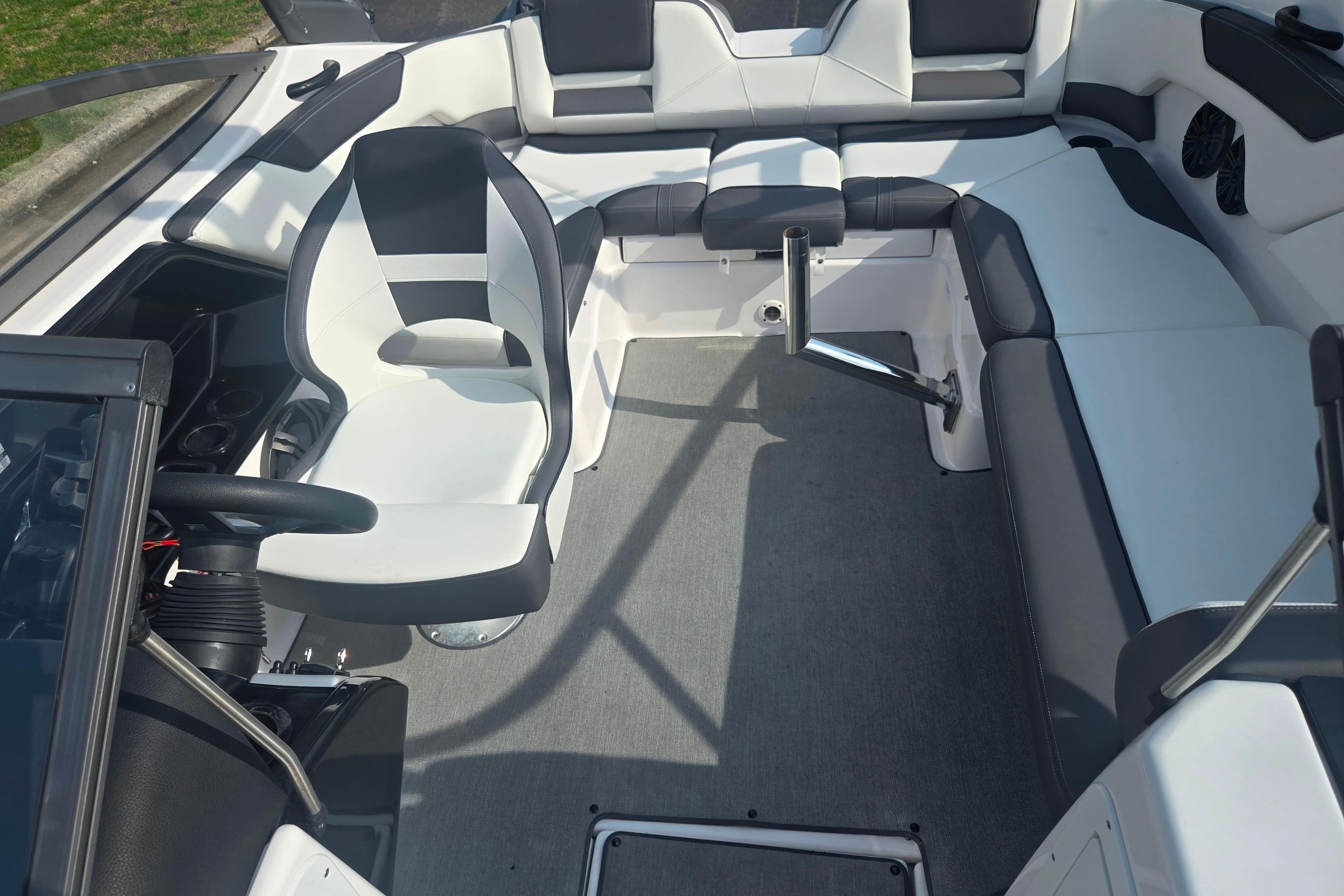 2022 Yamaha Boats AR210 interior with sleek seating and modern design.