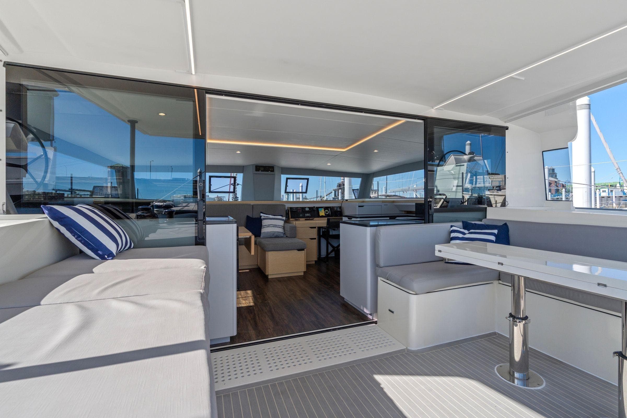 Luxurious 2019 Itacatamarans 14.99 yacht interior with modern seating and sleek design.