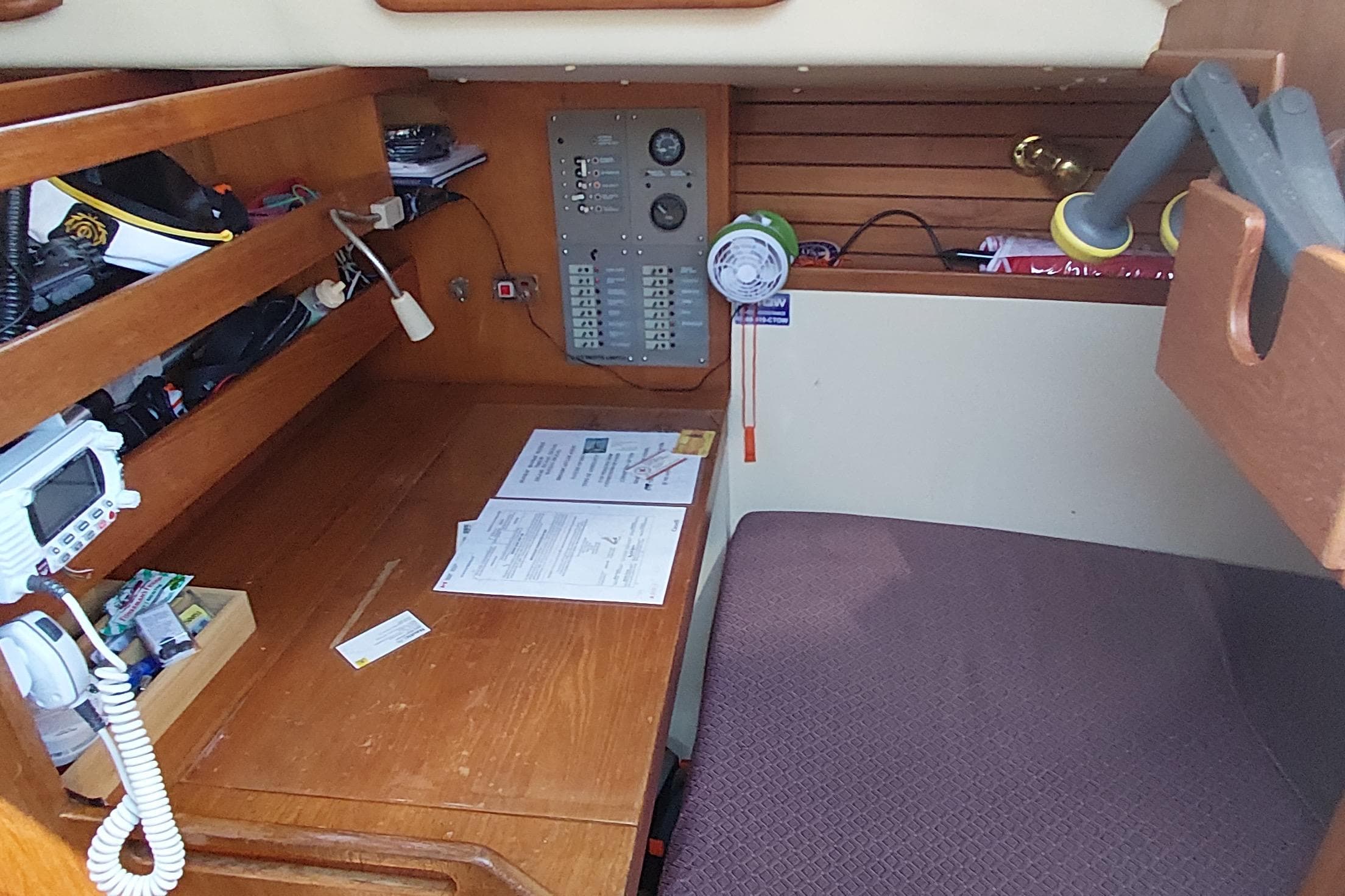 1983 CS 36 Traditional sailboat interior with navigation station and control panel.