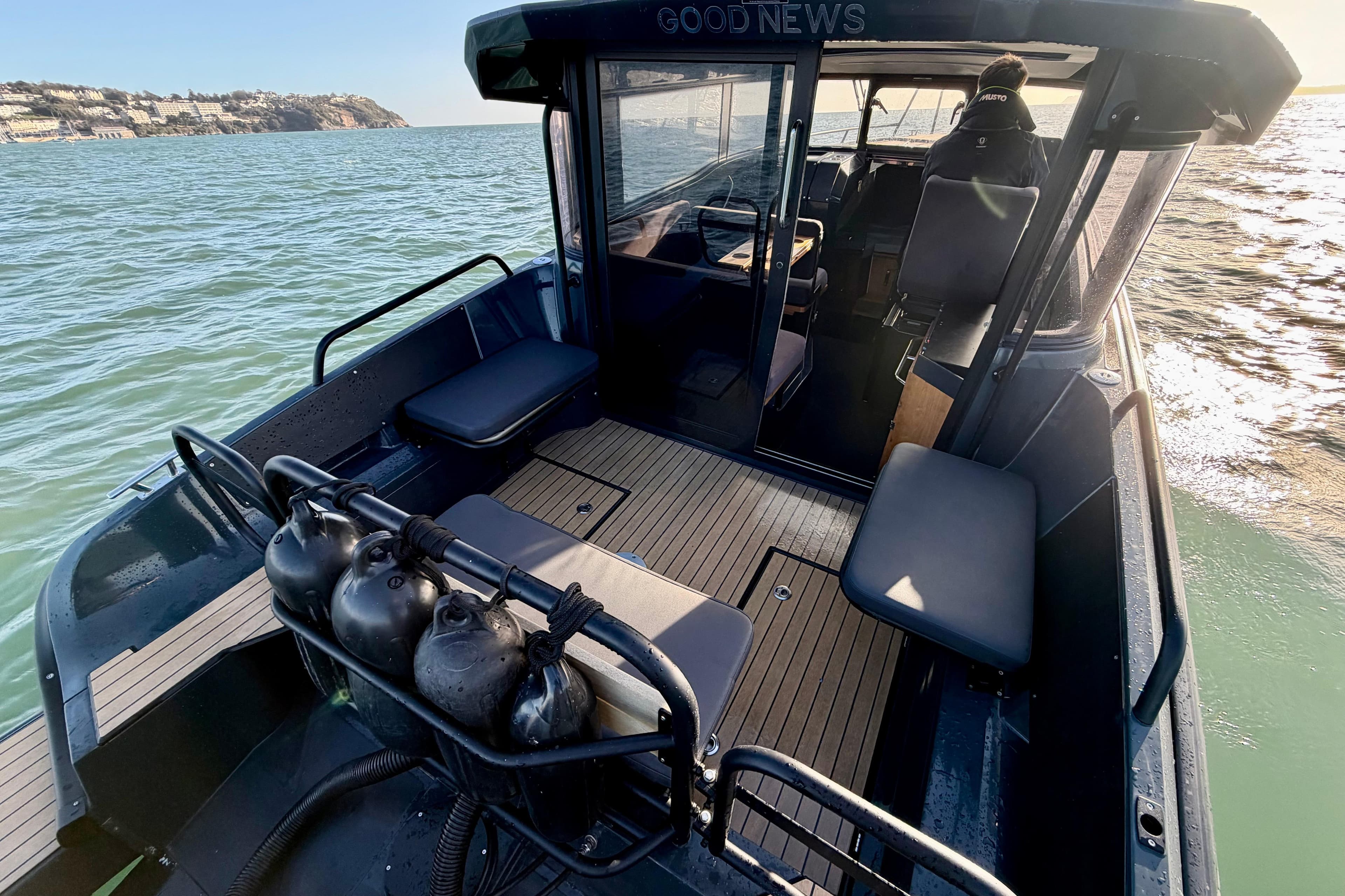 2022 XO EXPLR 10S boat interior with seating and ocean view.