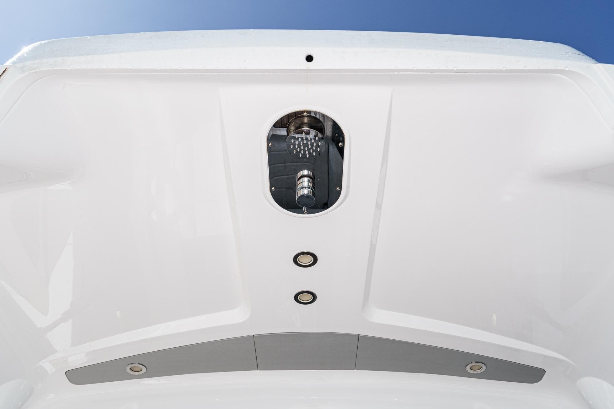 2023 Sunseeker 65 Sport Yacht, close-up of sleek hull design and fittings.