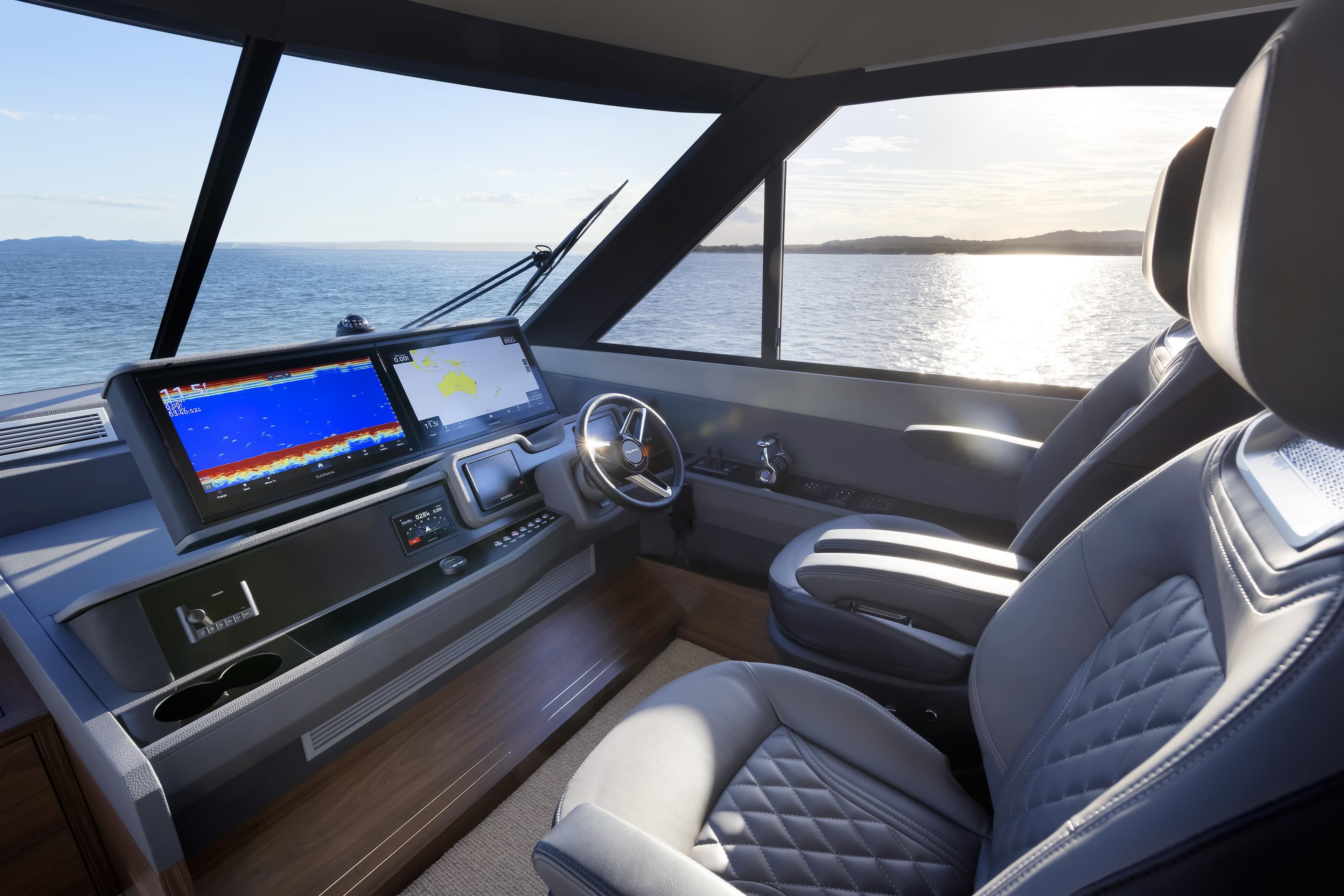 Interior of 2026 Maritimo M600 yacht with modern navigation system and luxurious seating.