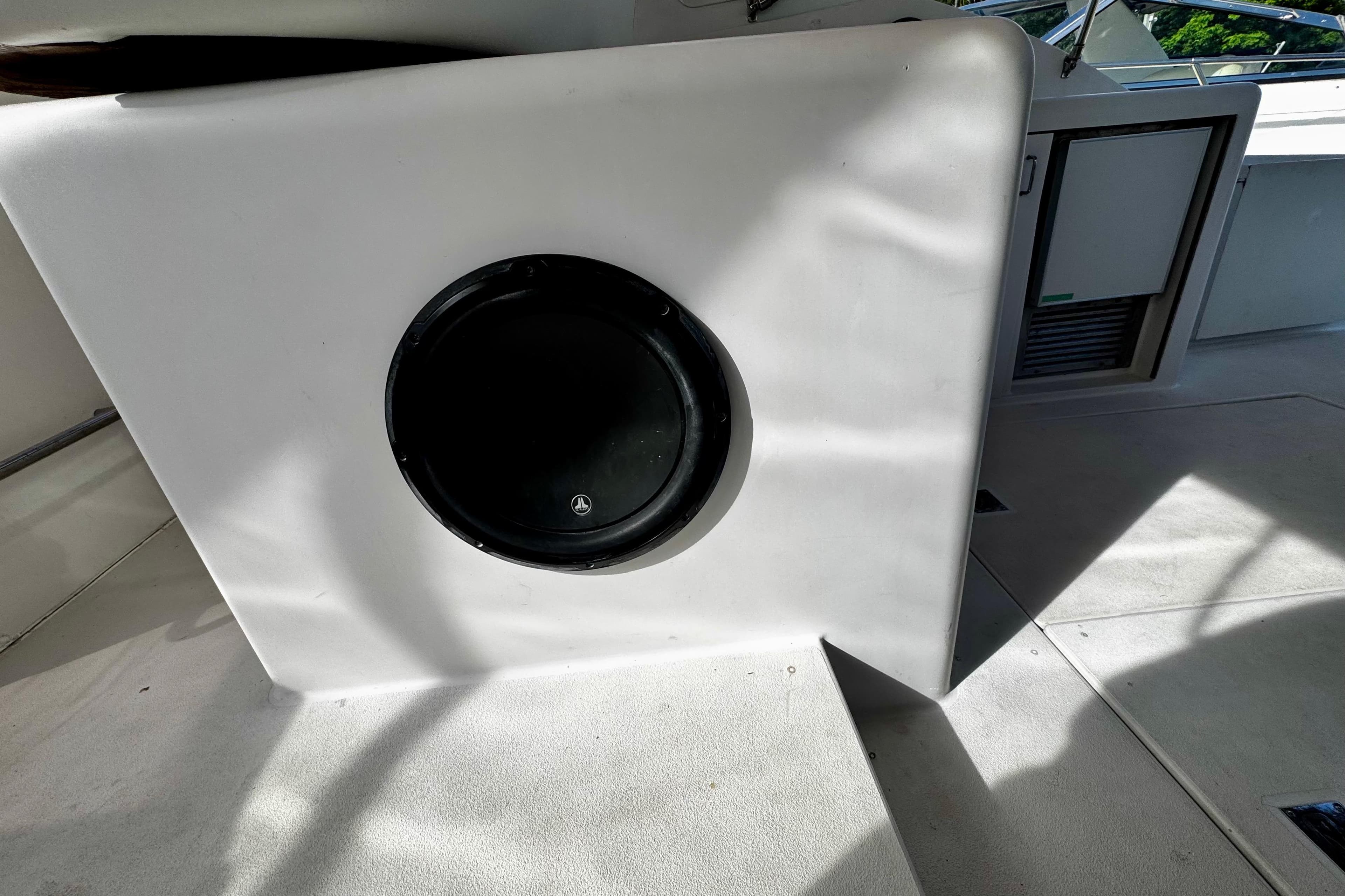 2000 Trojan 440 Express boat interior with built-in speaker and storage compartment.