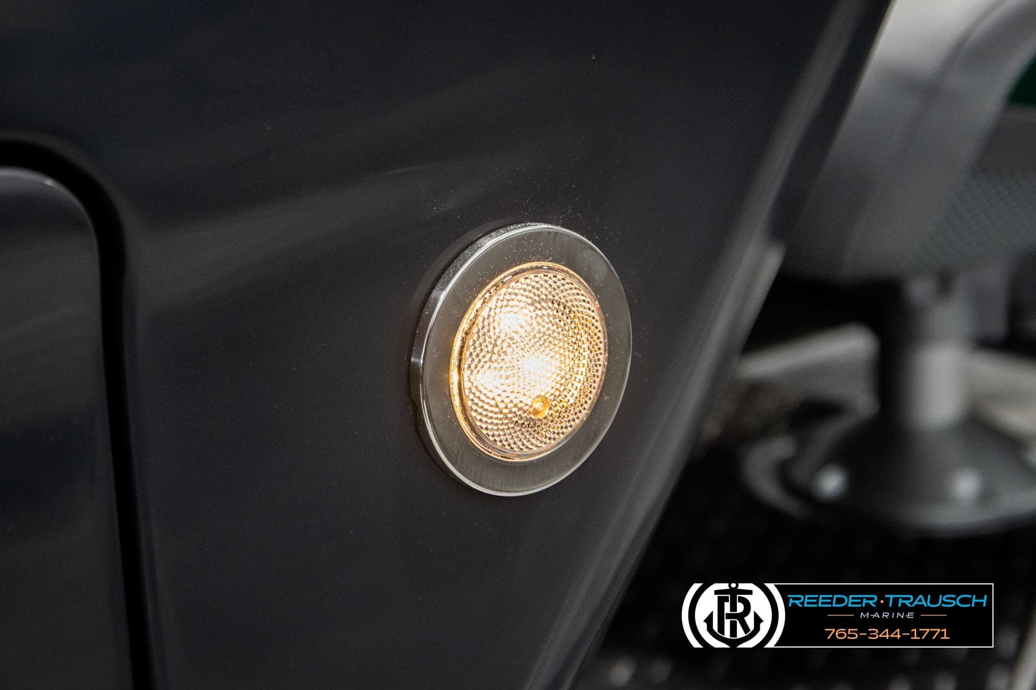 Close-up of a 2026 Bennington MOFBSF boat light, showcasing sleek design.