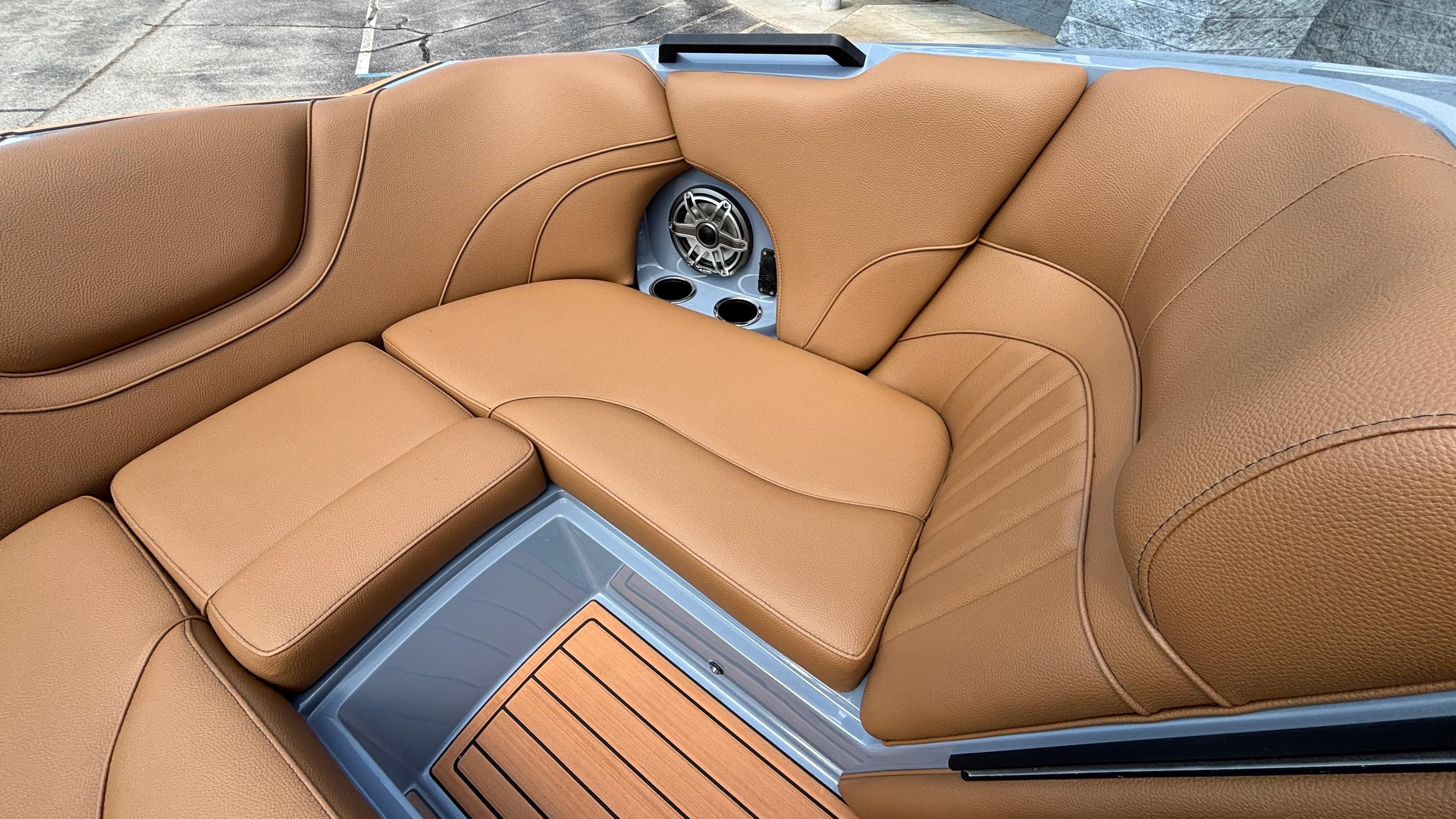 Luxurious tan leather seating in 2025 MB B52 23 Alpha boat interior.