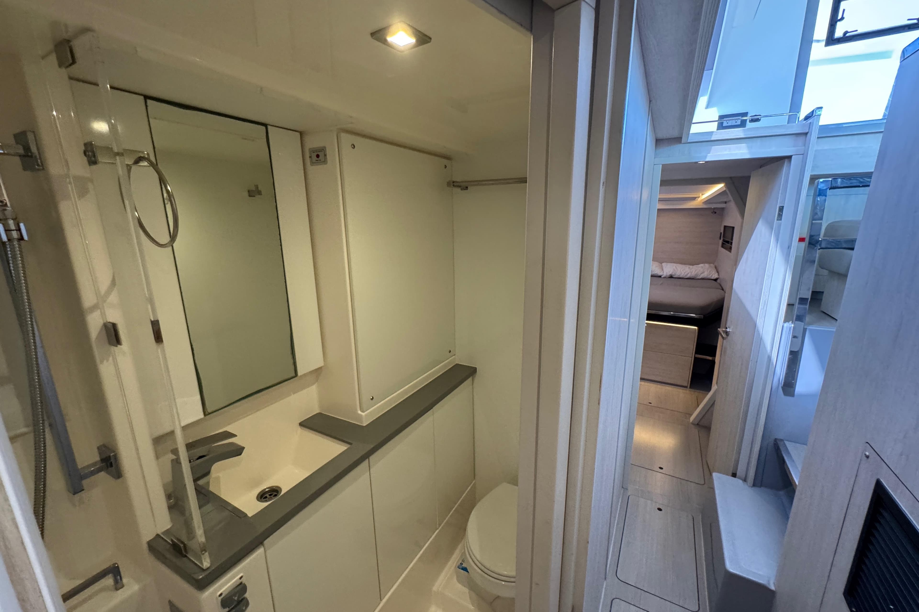 Modern bathroom and cabin interior of a 2021 Leopard 45 yacht.