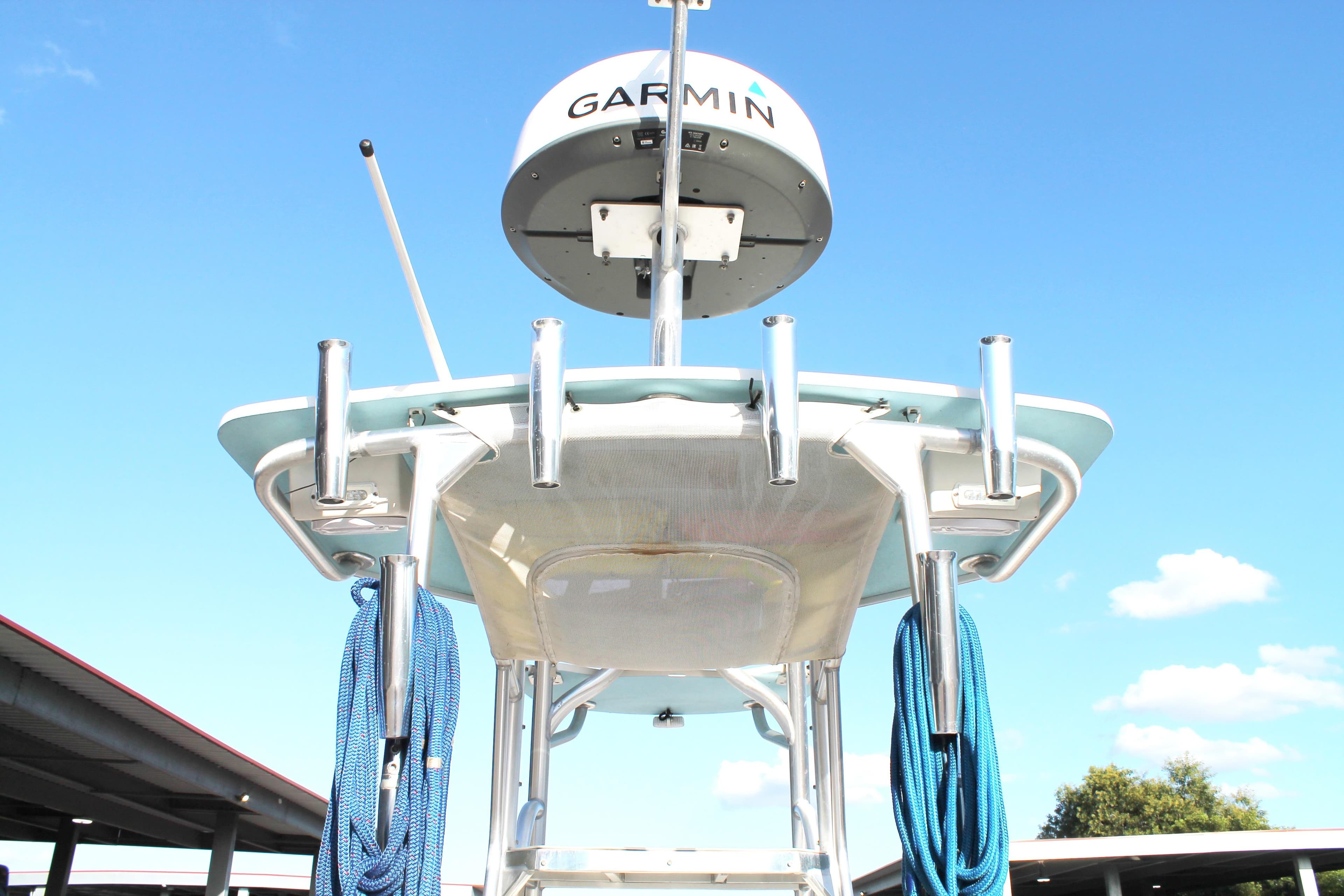 2018 Andros 26 Tarpon boat with Garmin radar, blue sky background.