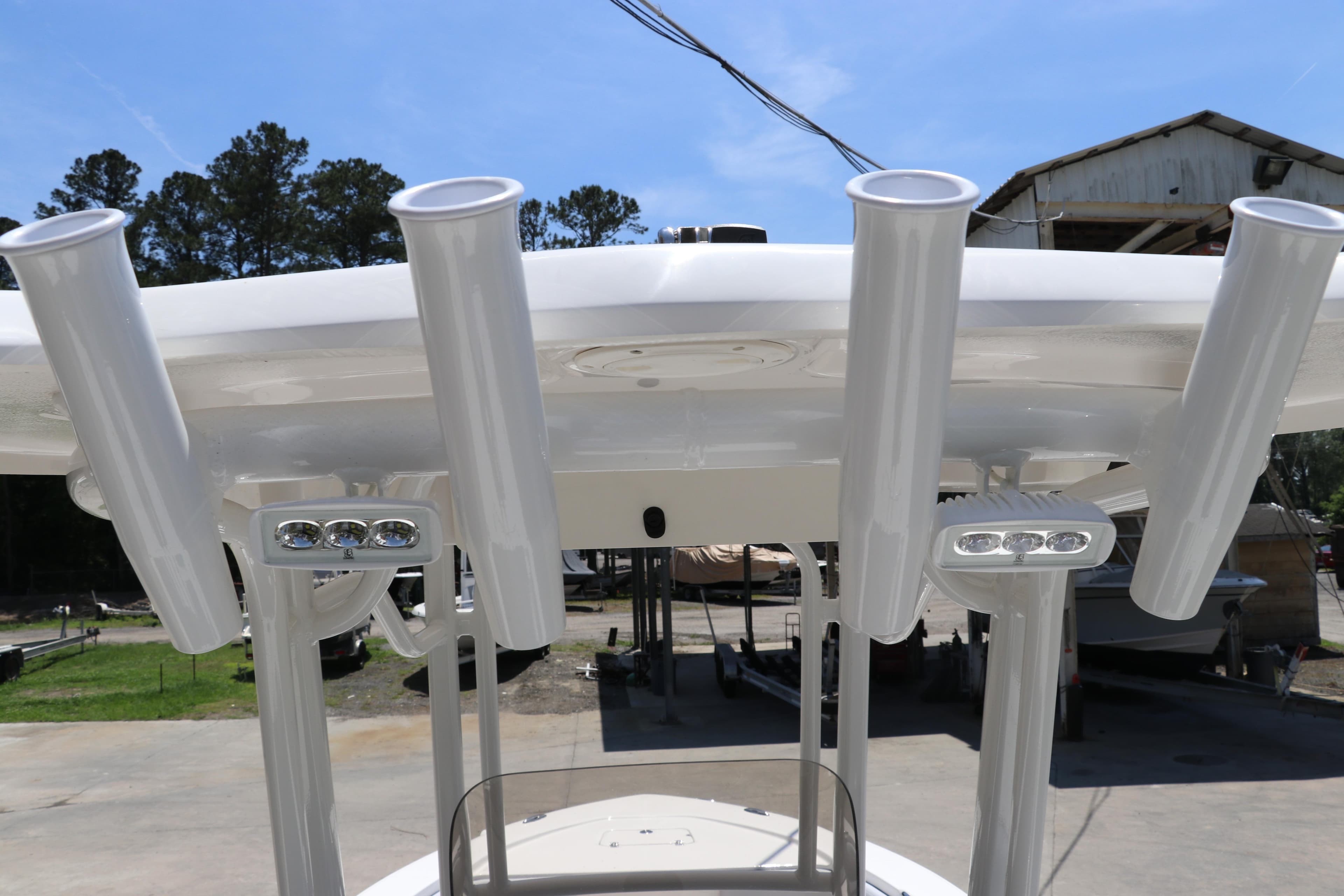 T-top rod holders and lights on a 2026 Robalo 226 Cayman boat.