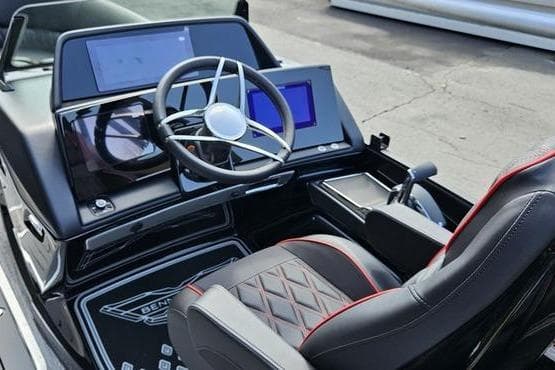 Interior of 2026 Bennington 23 RFB boat with modern dashboard and steering wheel.