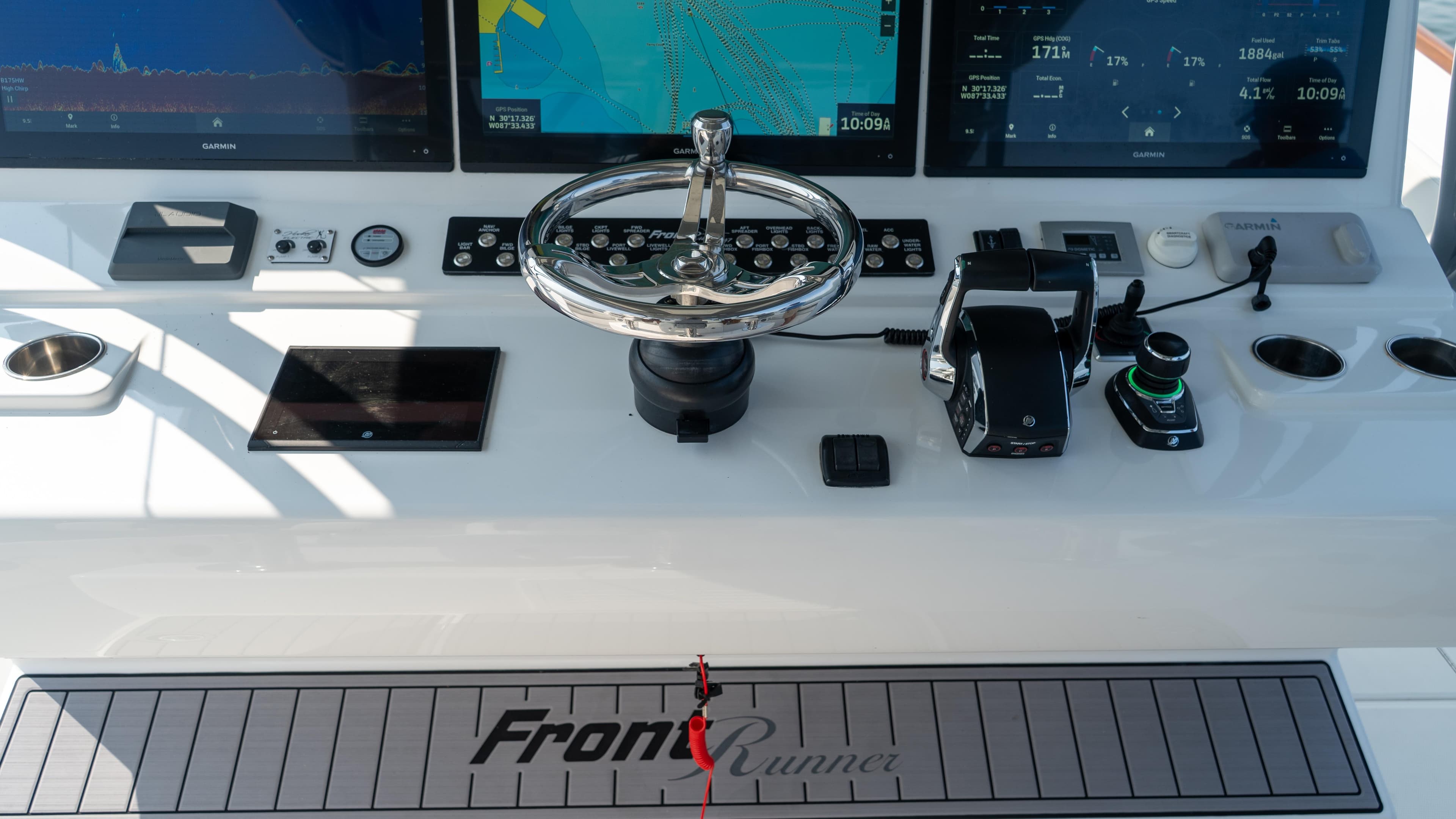 2023 Front Runner 47 Center Console dashboard with navigation screens and controls.