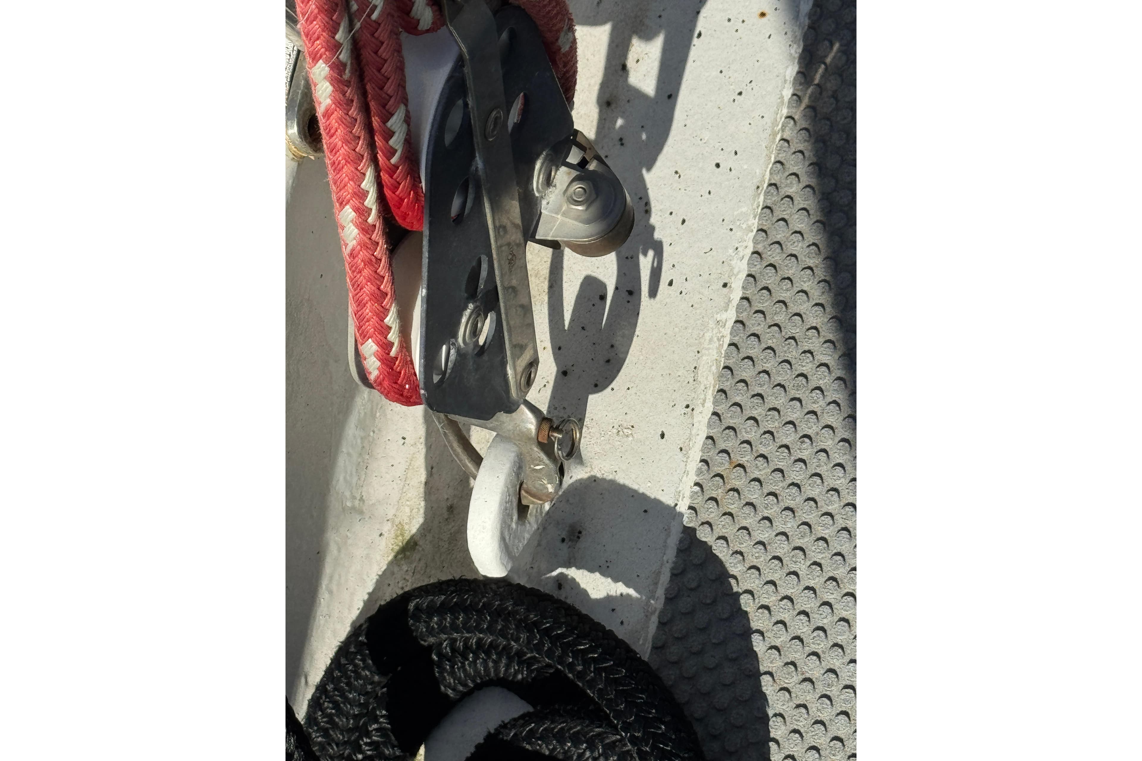 Rope and pulley system on 1992 Bruce Bingham Custom Steel Hull 47 boat deck.