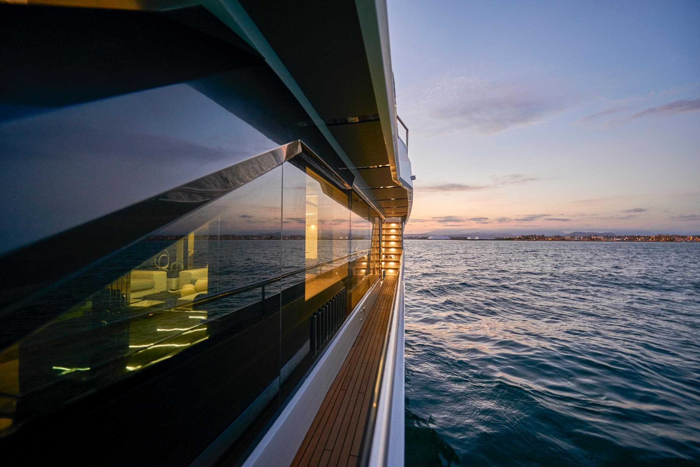Astondoa Century 100 yacht, 2025 model, cruising at sunset on open water.