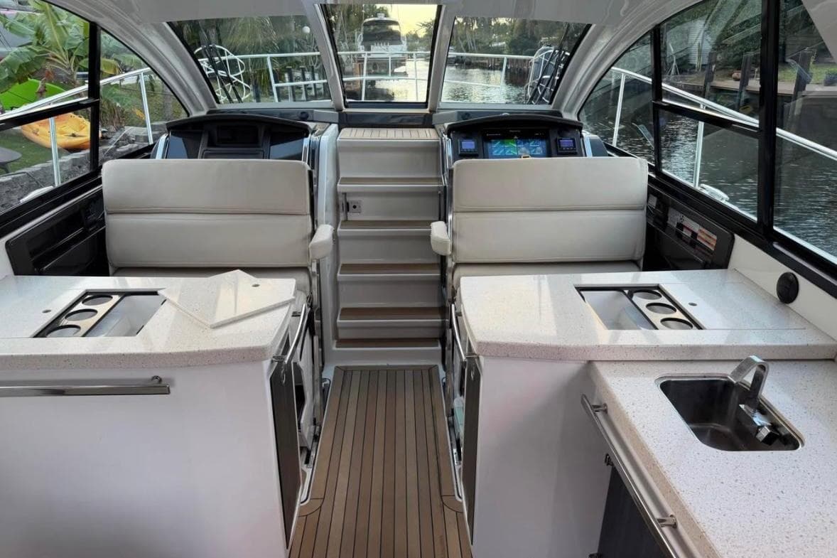 Interior of a 2015 Monterey 360 Sport Coupe yacht with modern amenities.