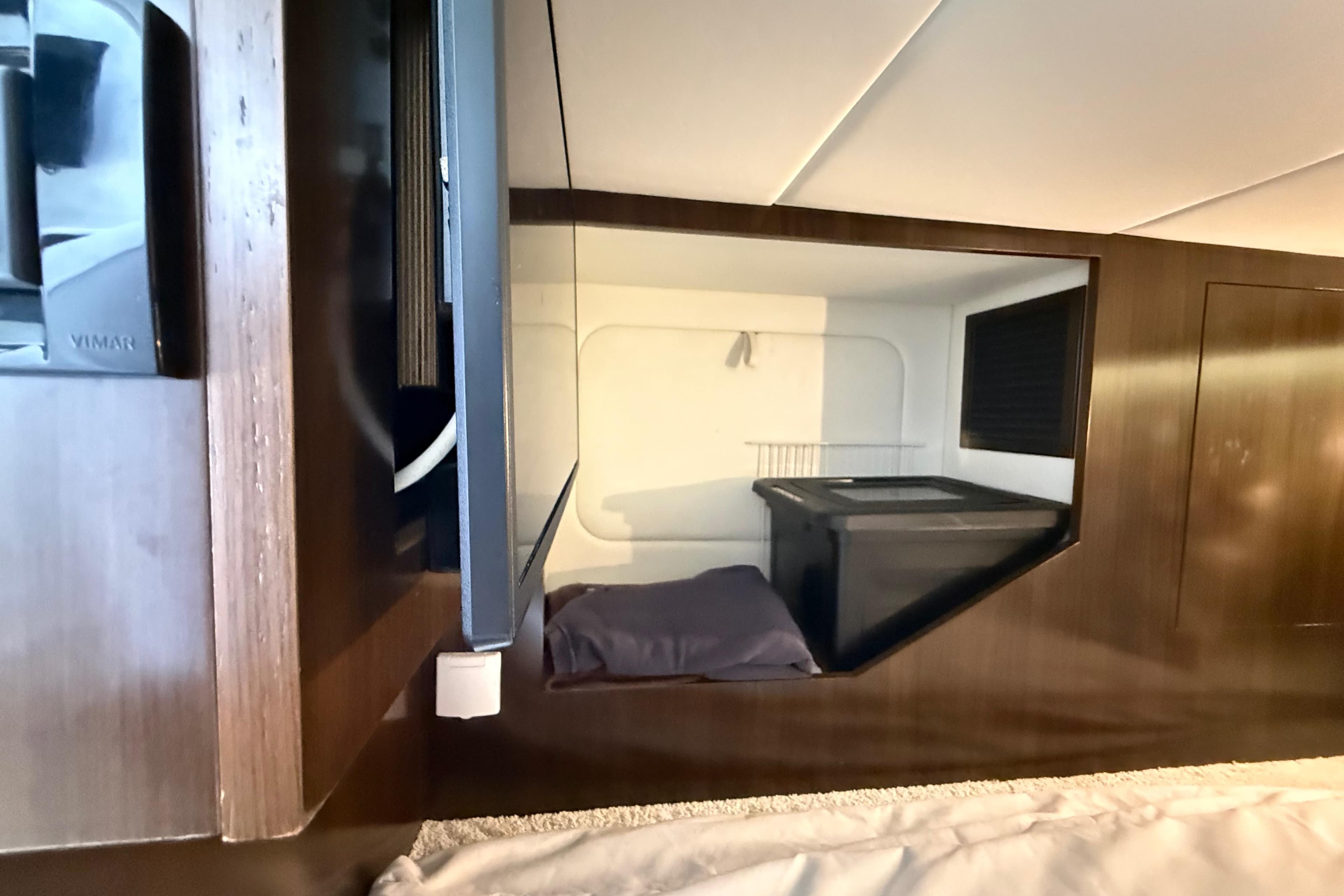 Interior cabin view of 2021 Cruisers Yachts 38 GLS OB, featuring modern design and amenities.