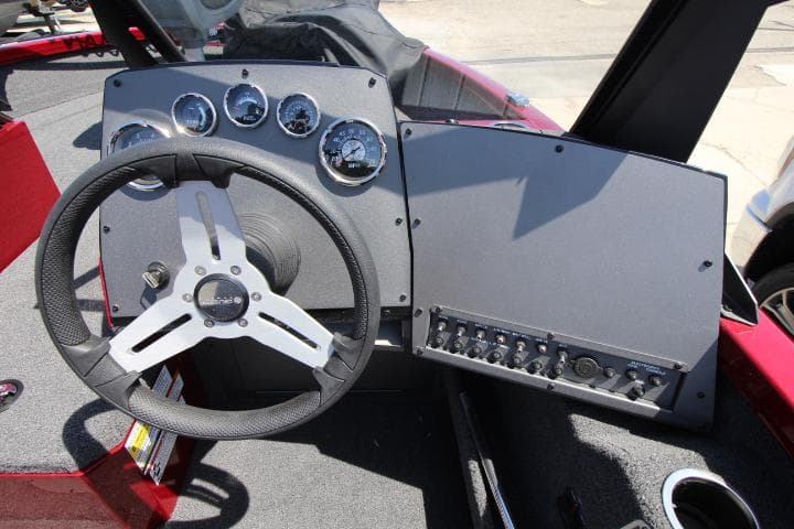 2025 Vexus ADX180LS boat dashboard with steering wheel and control panel.