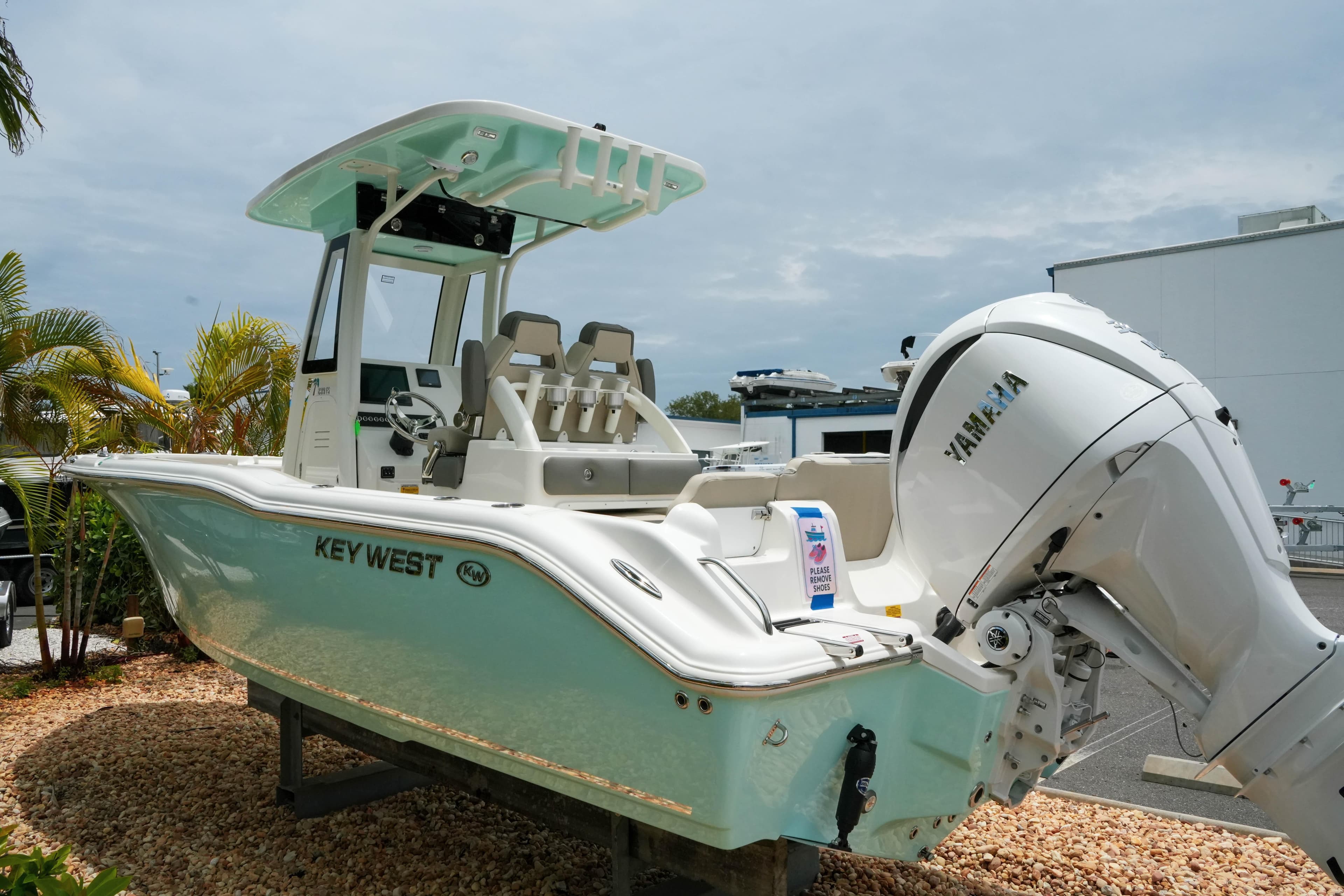 2026 Key West 239 FS boat with Yamaha engine displayed outdoors.