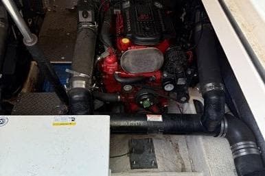 Engine compartment of a 2007 Regal Commodore 4060 boat, showcasing mechanical components.