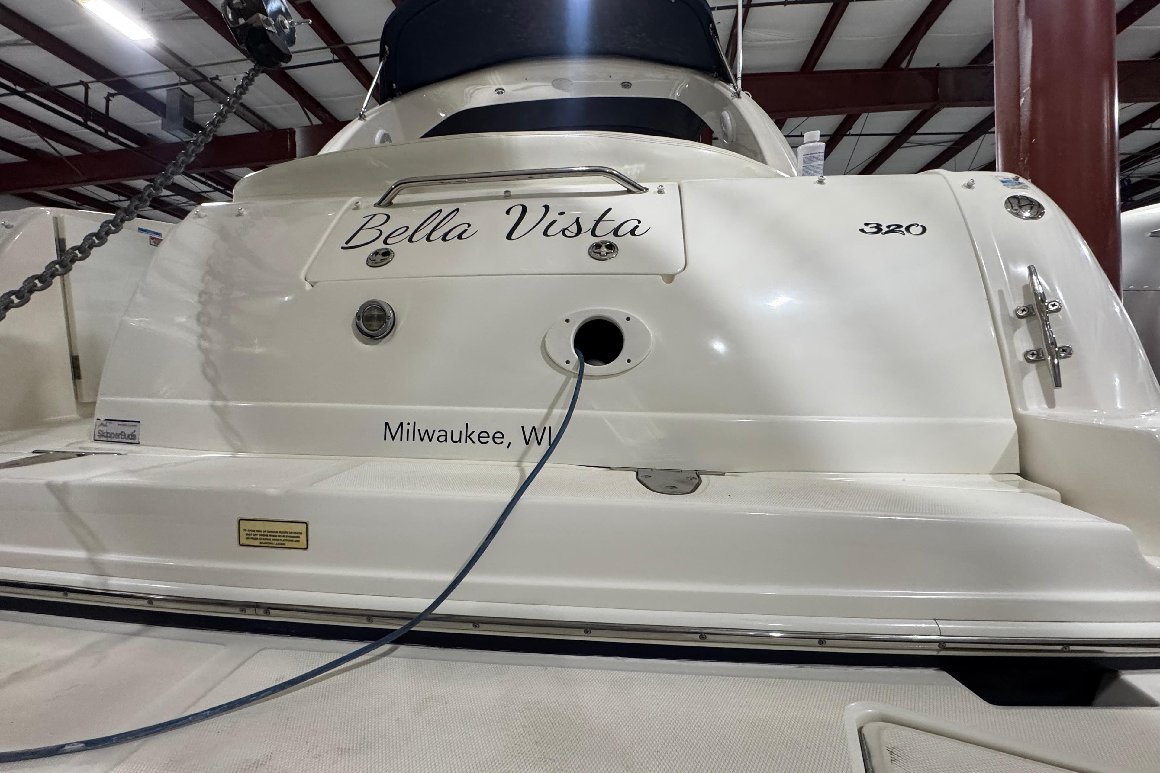 2004 Sea Ray Sundancer 320 boat named "Bella Vista" docked indoors, Milwaukee, WI.