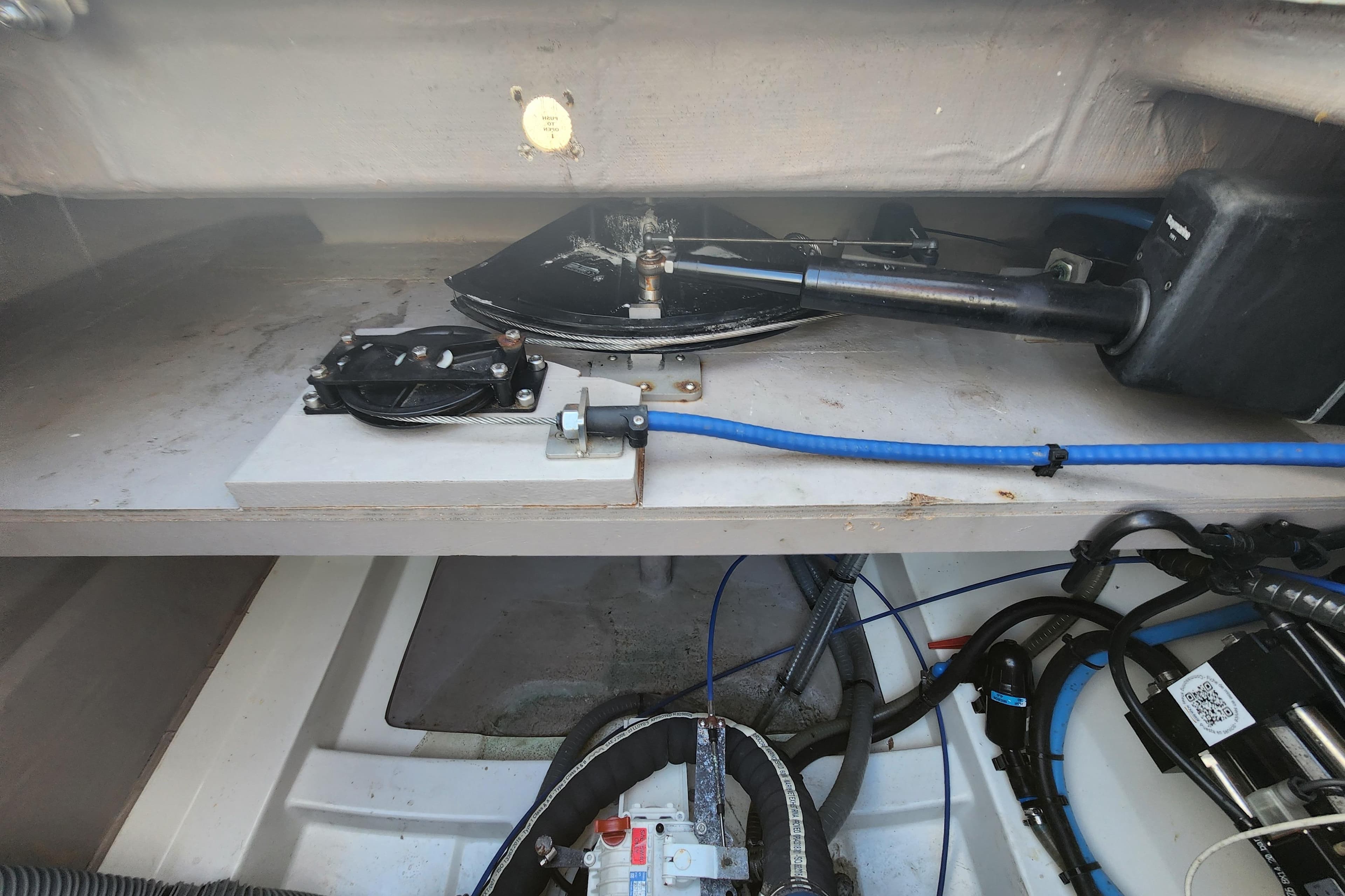 2023 Bali 4.2 boat interior showing mechanical components and wiring.