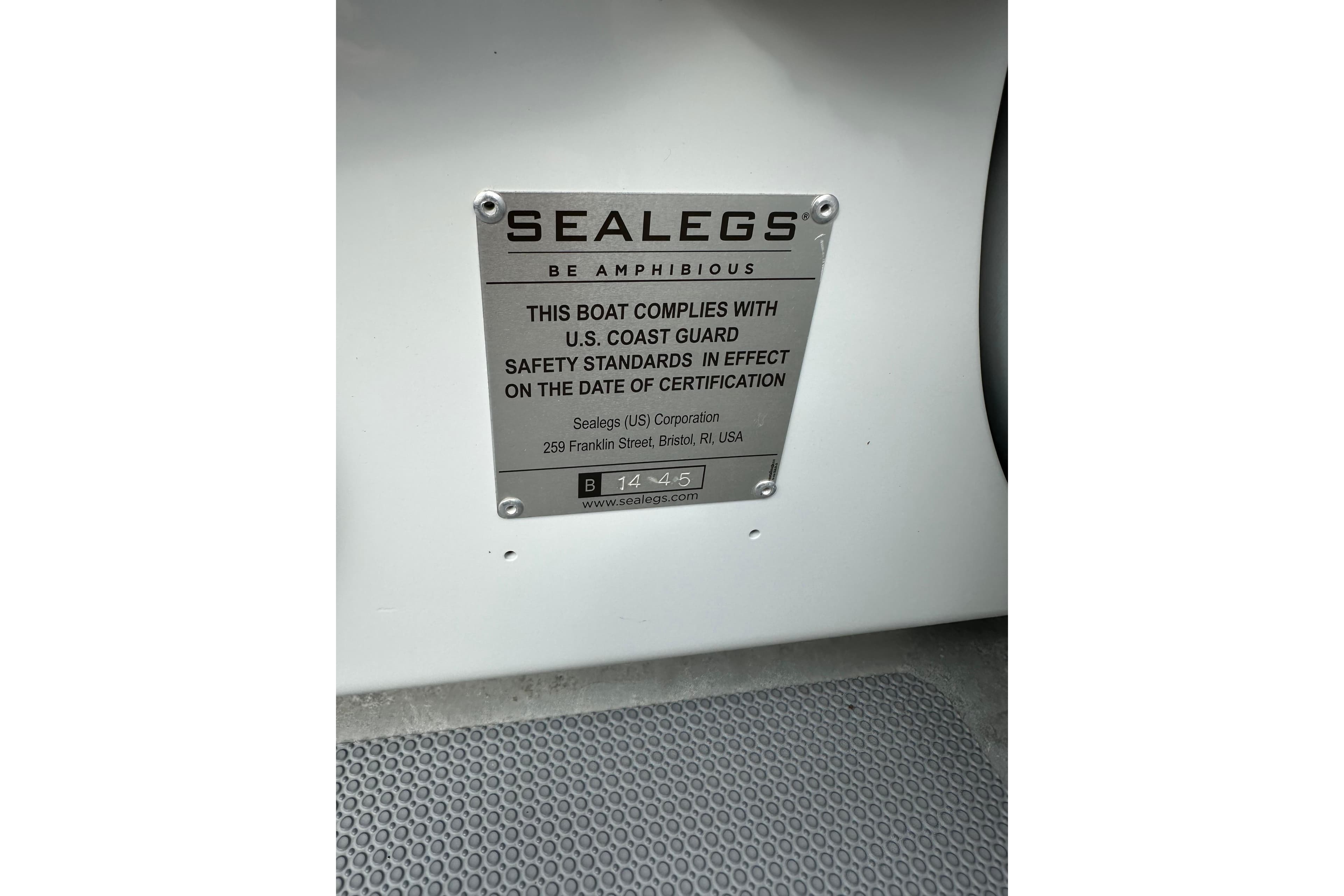 Plaque on 2020 Sealegs 9m Amphibious RIB, U.S. Coast Guard safety compliance.