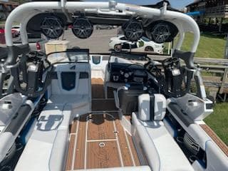 2017 Nautique Super Air Nautique G23 boat interior with premium seating and sound system.