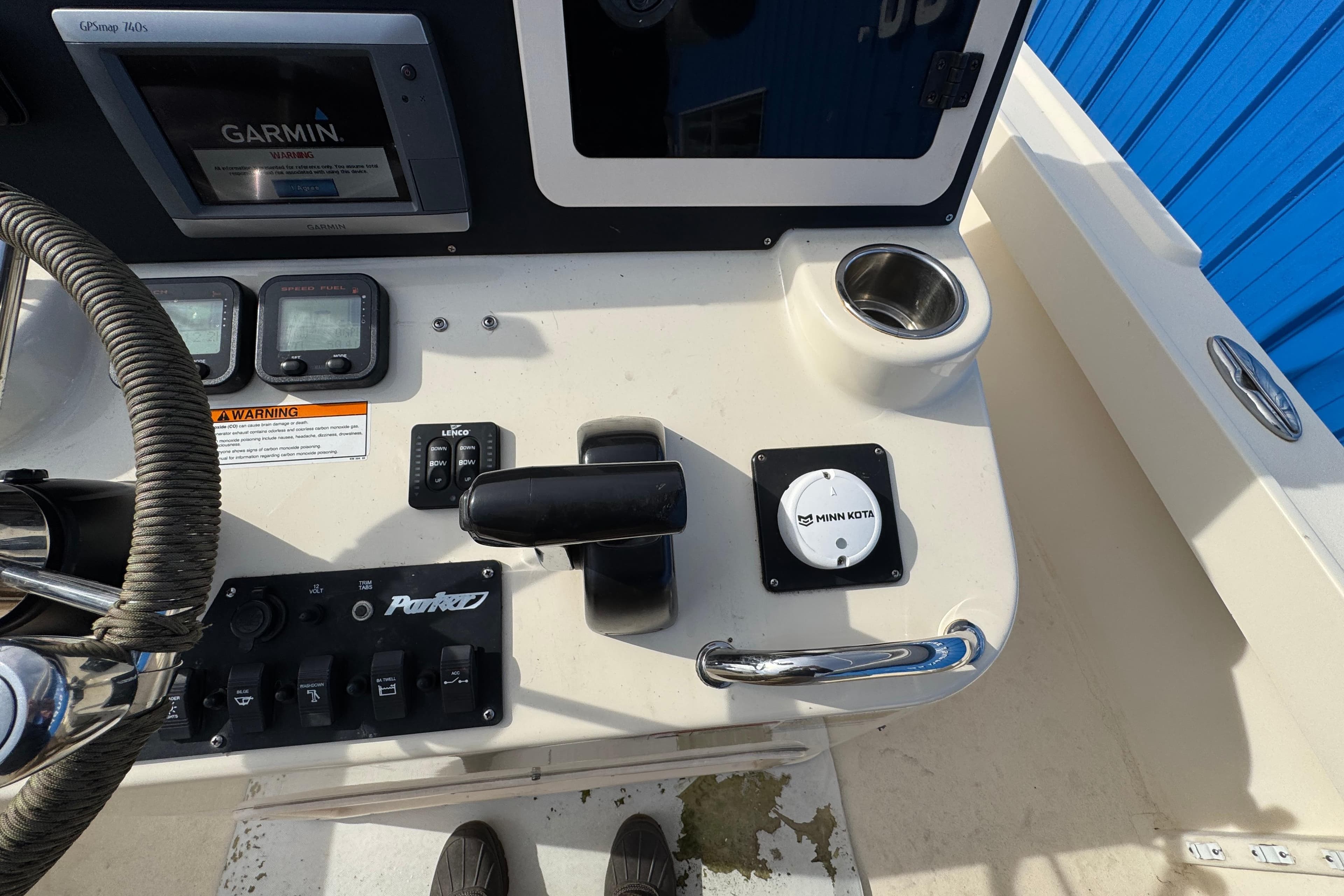 Control panel of a 2011 Parker 2300 Special Edition boat with Garmin GPS and Minn Kota controls.