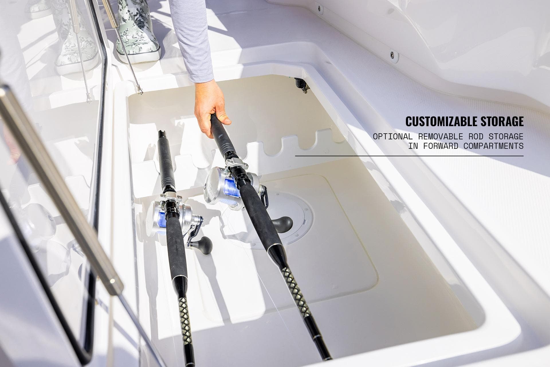 Customizable rod storage on 2026 Invincible 36 Catamaran, featuring removable compartments.