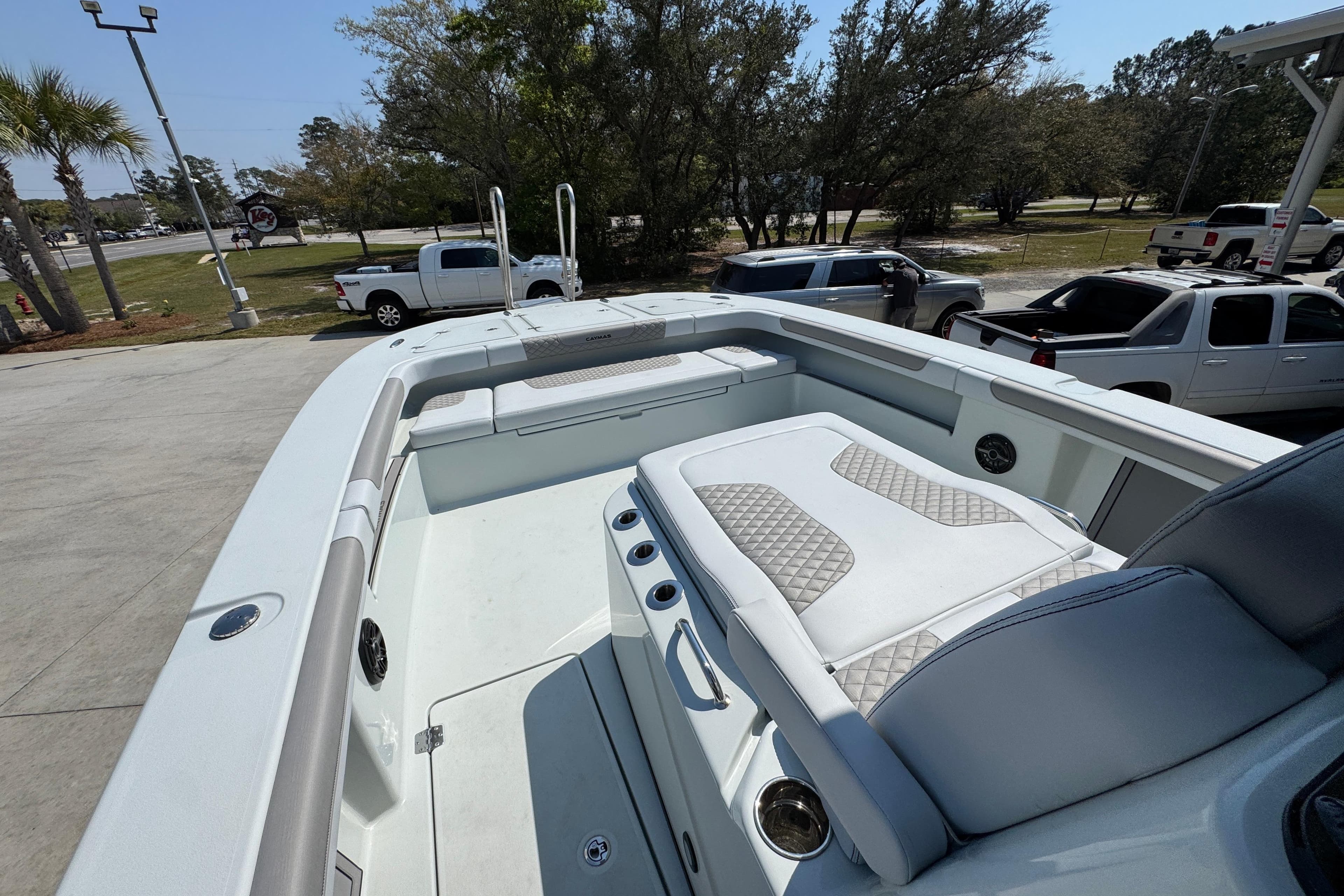 2026 Caymas 29 CT boat interior with cushioned seating and modern design.