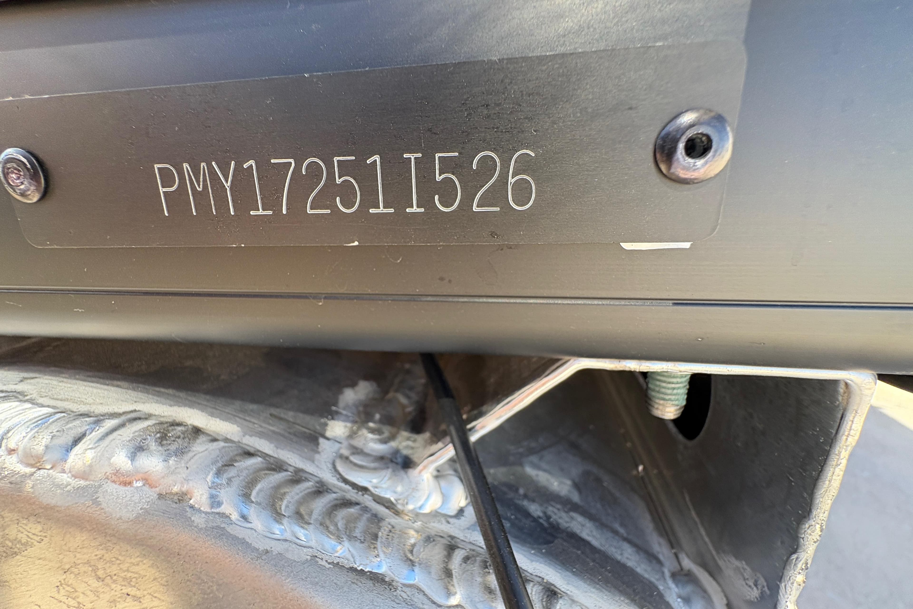2026 Premier 210 Sunsation RF boat identification number plate close-up.