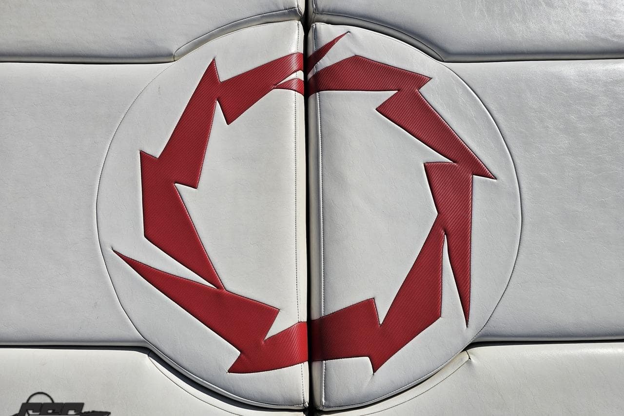 Red lightning bolt design on white upholstery of 2009 Fountain 47 Lightning boat.