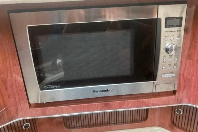 Panasonic microwave in 1999 Sea Ray 420 Aft Cabin yacht kitchen.