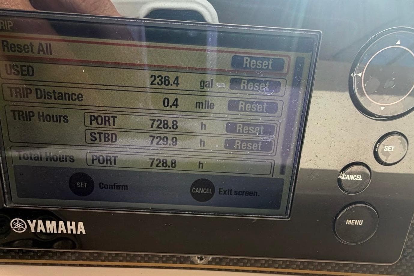 Yamaha display showing fuel usage and trip data on 2014 Grady-White Express 330 boat.