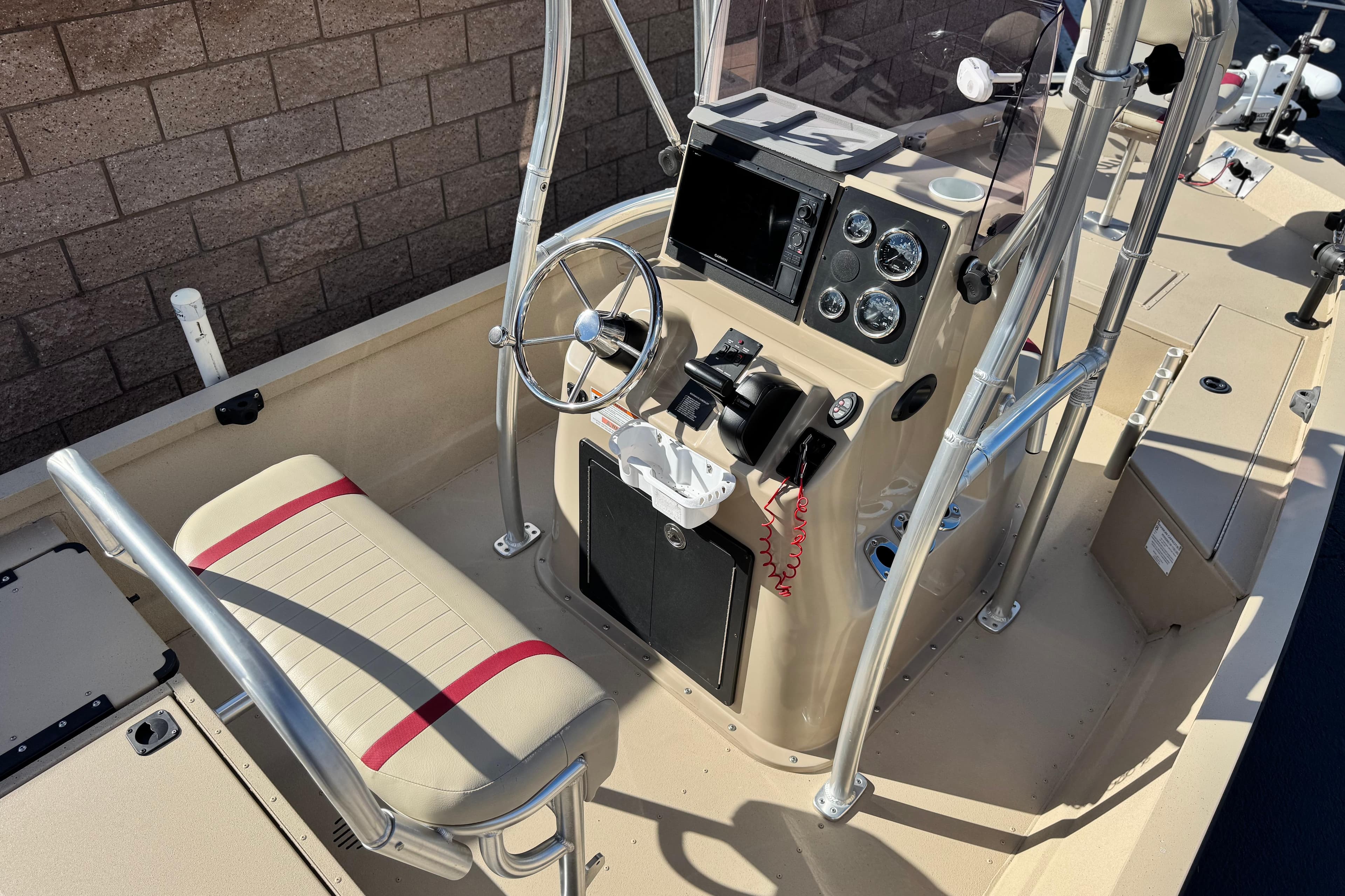 2021 G3 Bay 20 DLX boat interior with steering console and seating.