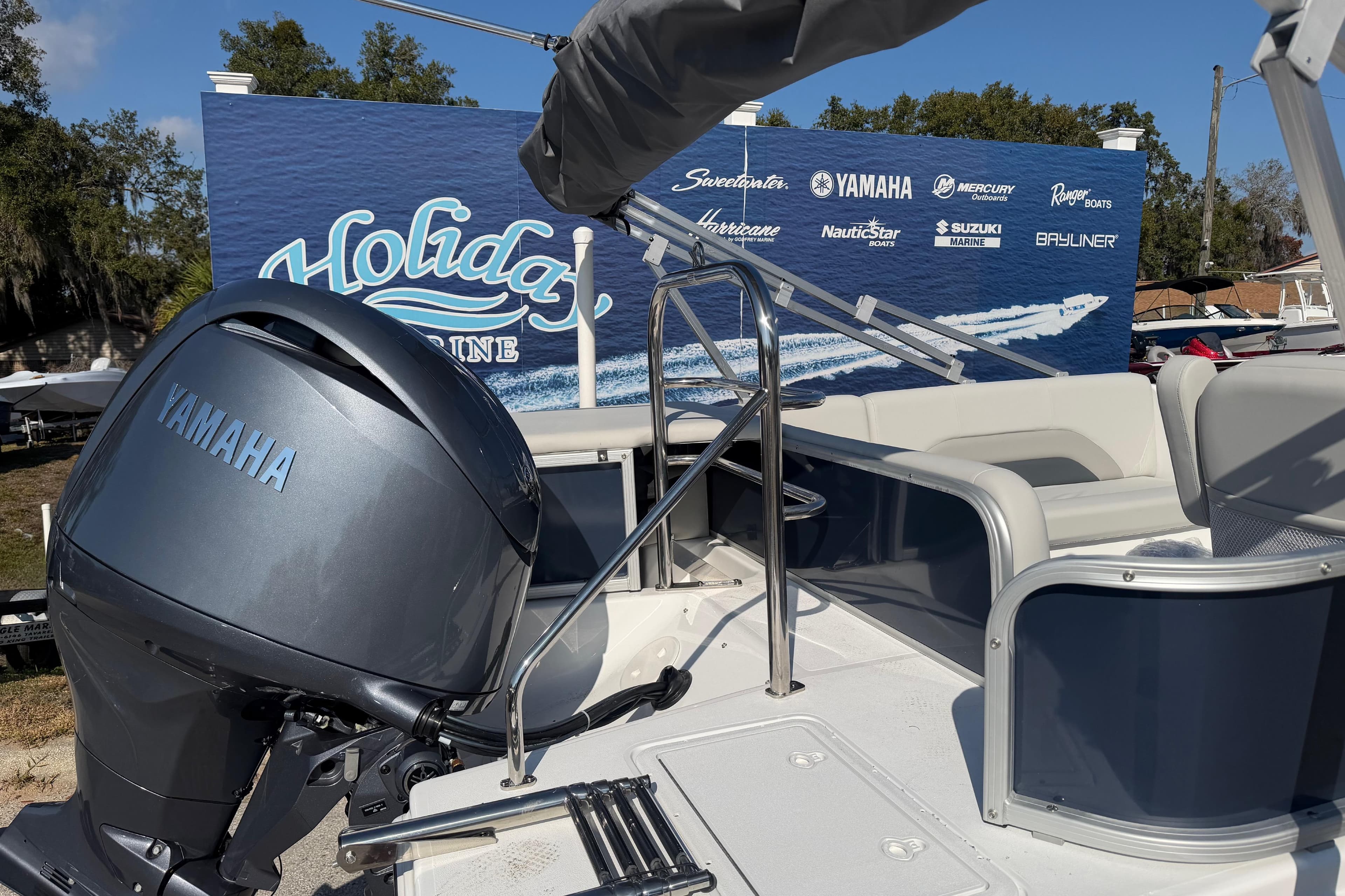 2026 Hurricane FunDeck 198 RE OB boat with Yamaha outboard motor at Holiday Marine.