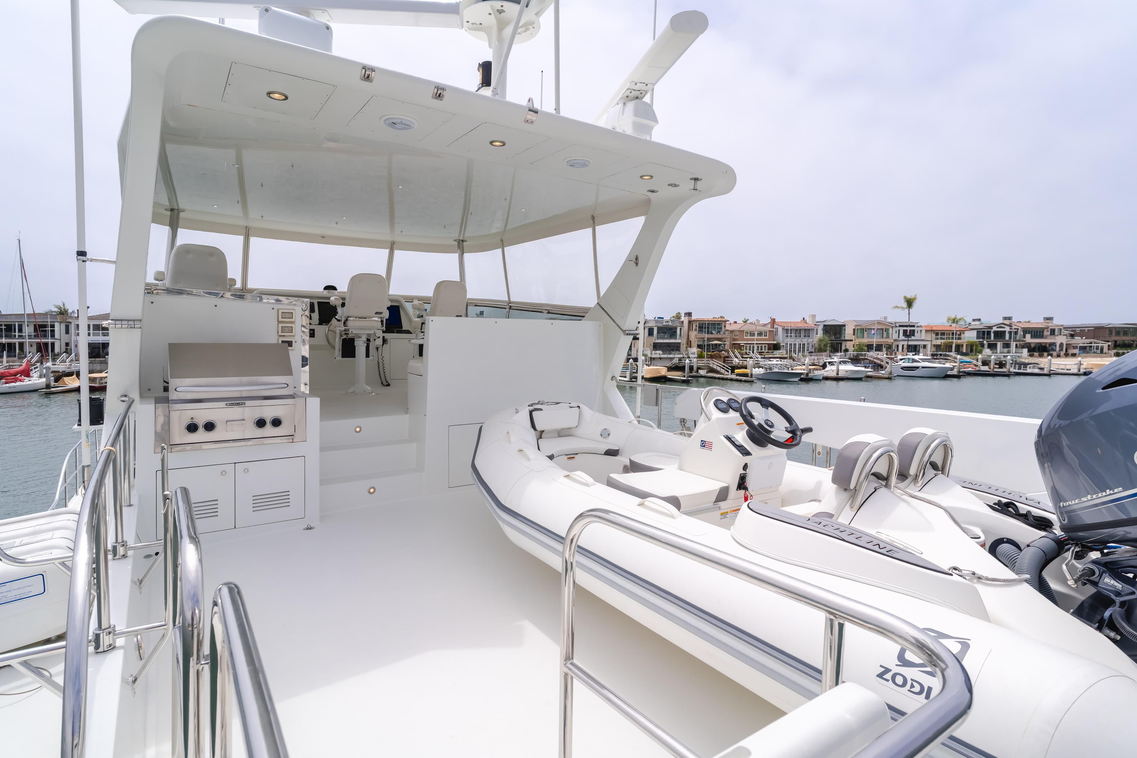 2006 Cheoy Lee 72' Raised Pilot House yacht with spacious deck and tender boat.