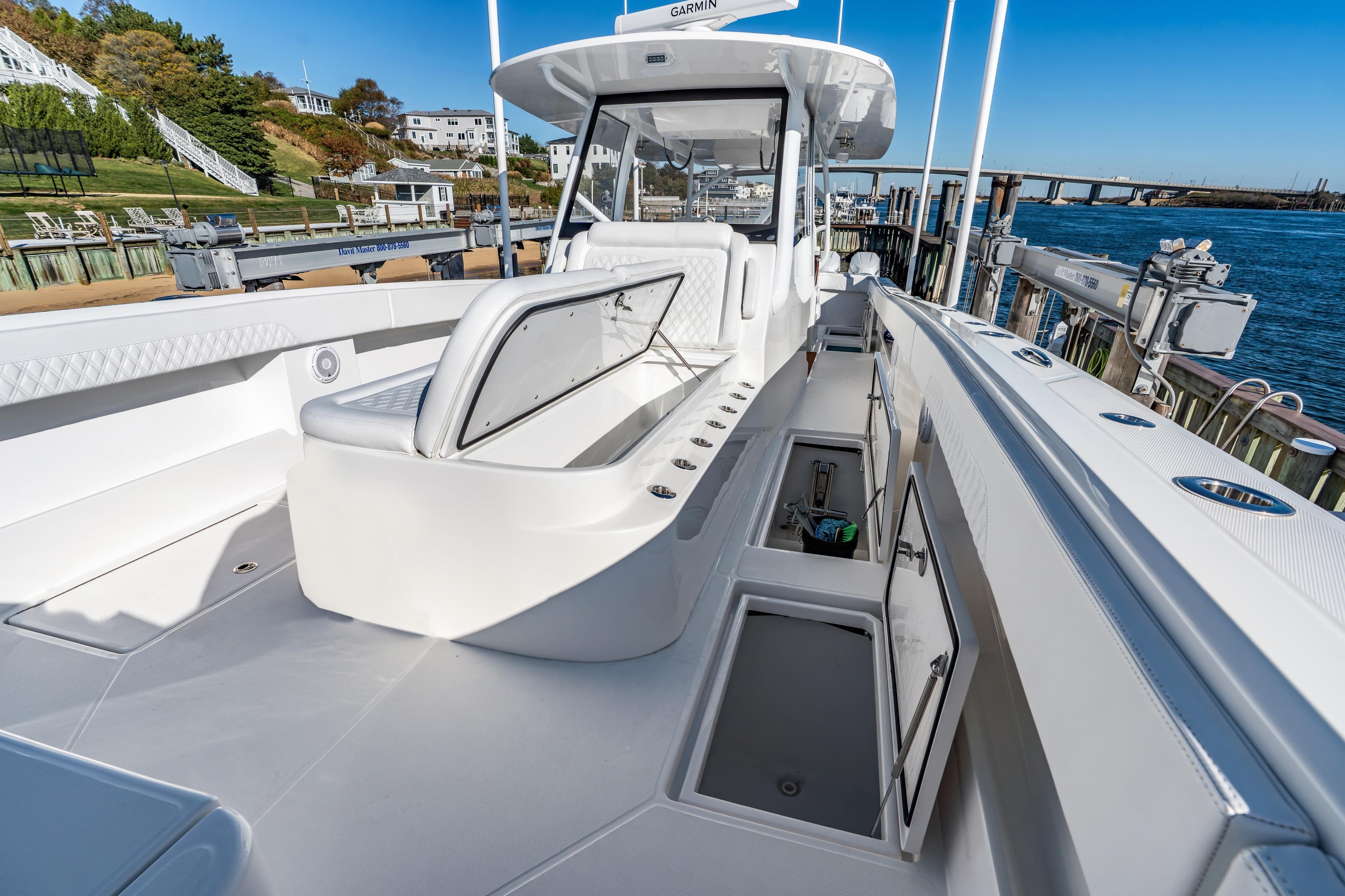 2025 Front Runner 43 Catamaran docked, showcasing spacious deck and storage compartments.
