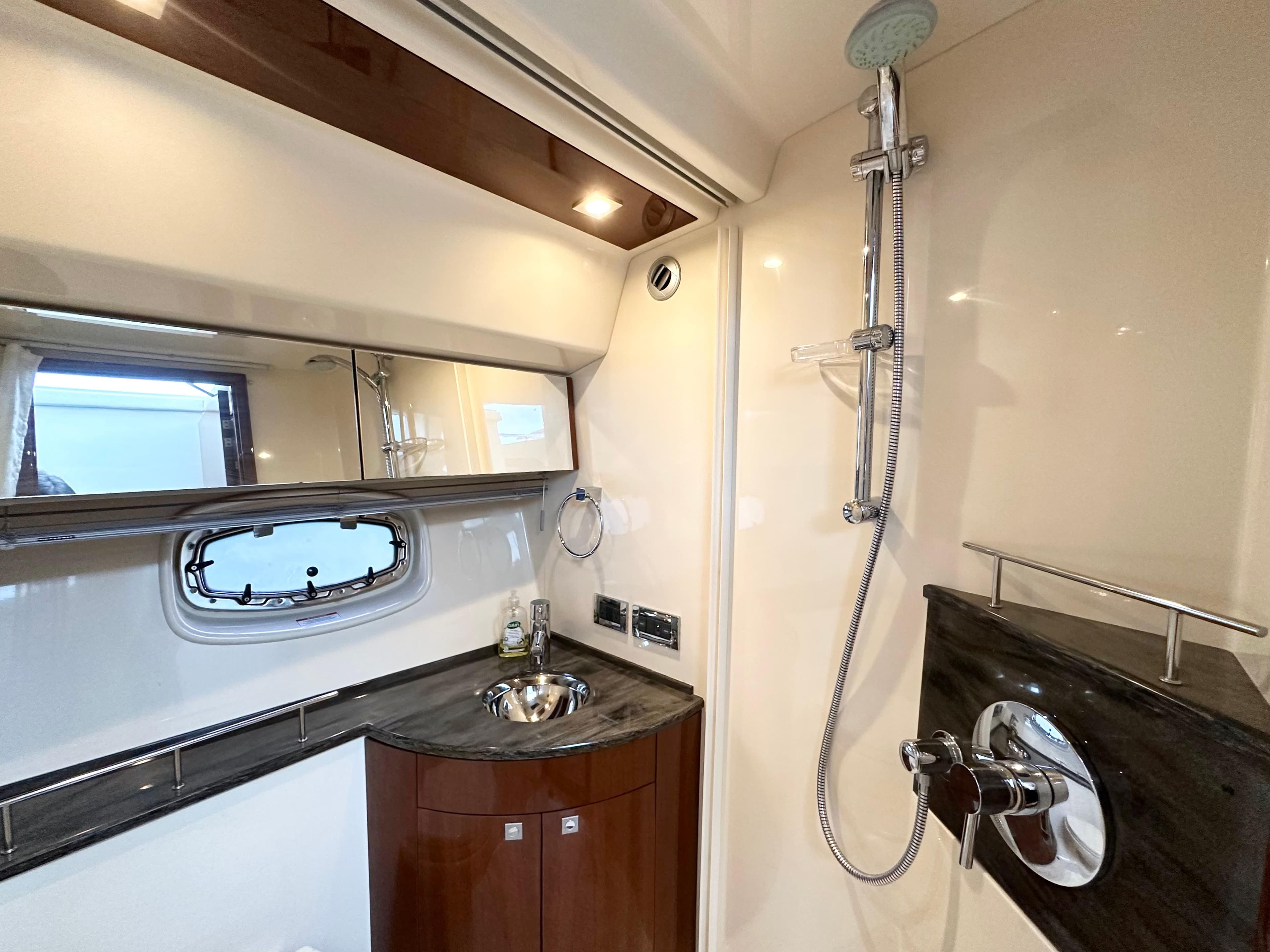 Luxurious bathroom on a 2012 Sea Ray 450 Sedan Bridge yacht.