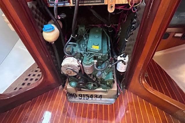 Engine compartment of a 1987 Beneteau First 375 sailboat with visible components.