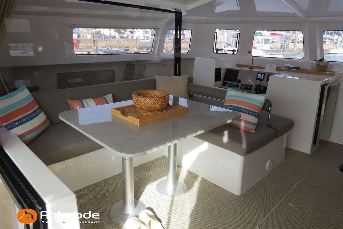 Interior of 2022 NEEL 43 yacht with modern seating and navigation area.