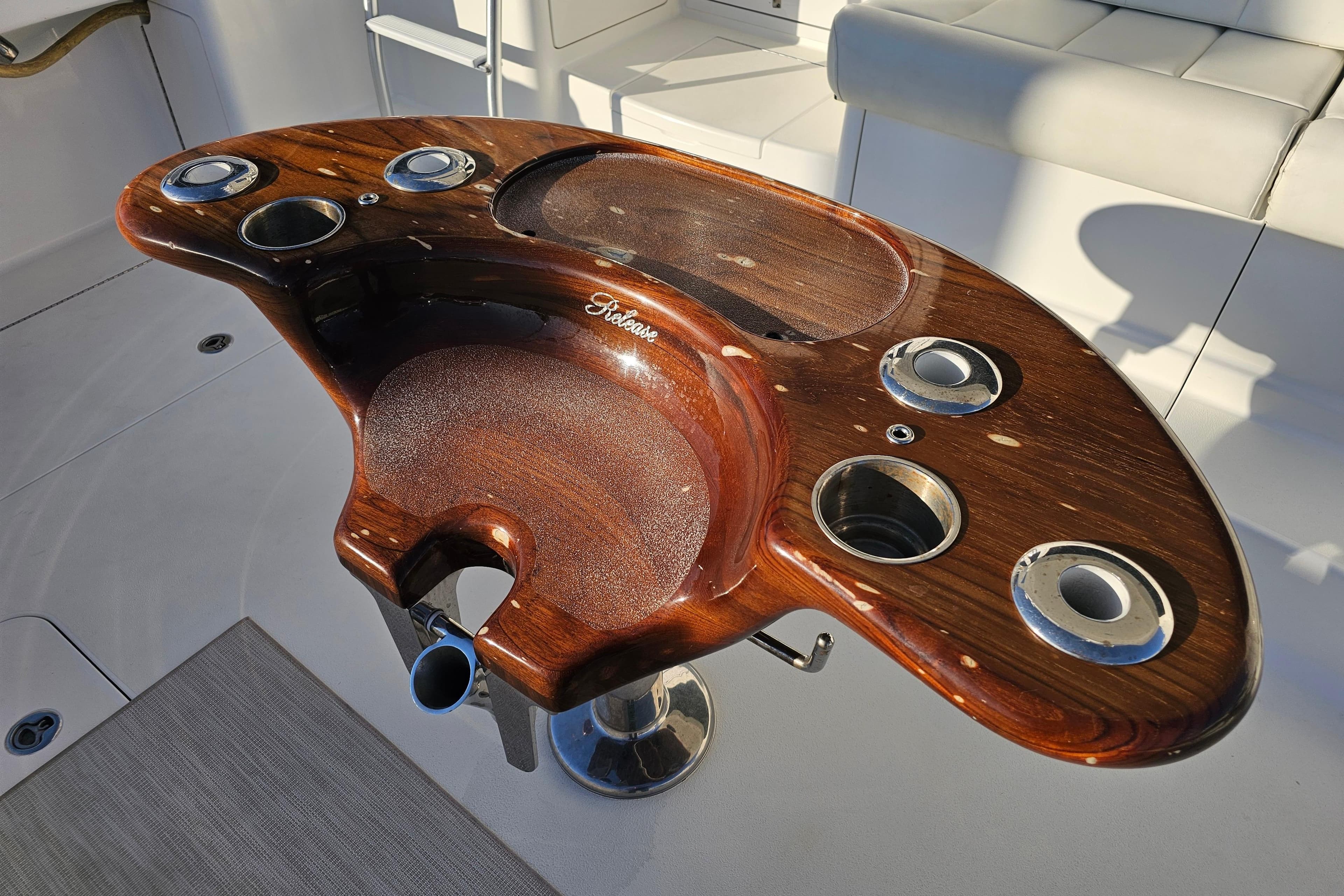 Luxurious wooden helm station on 2013 Viking 42 Convertible yacht.