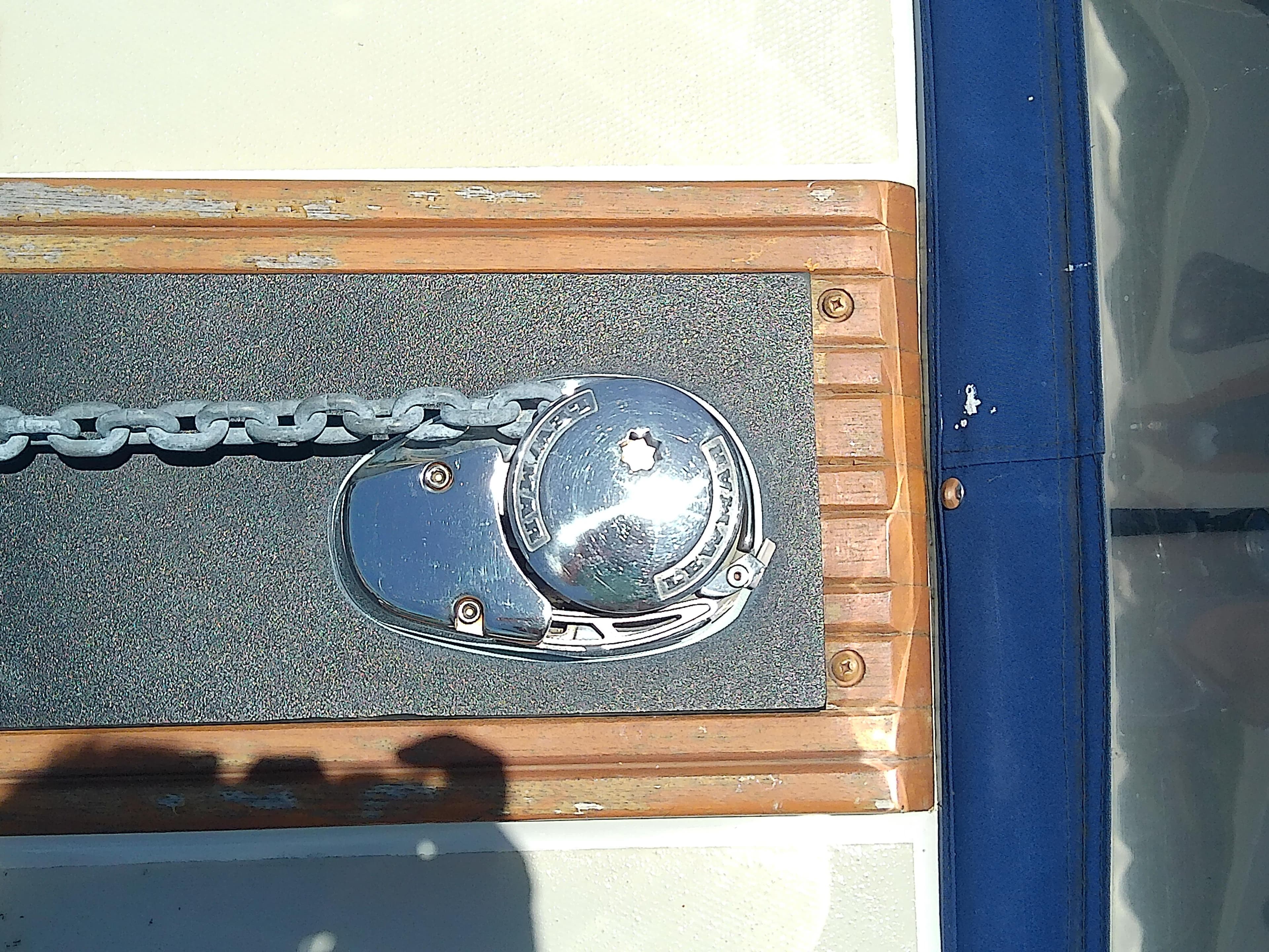 Anchor windlass on 1985 Robalo 2520 Center Console boat deck.