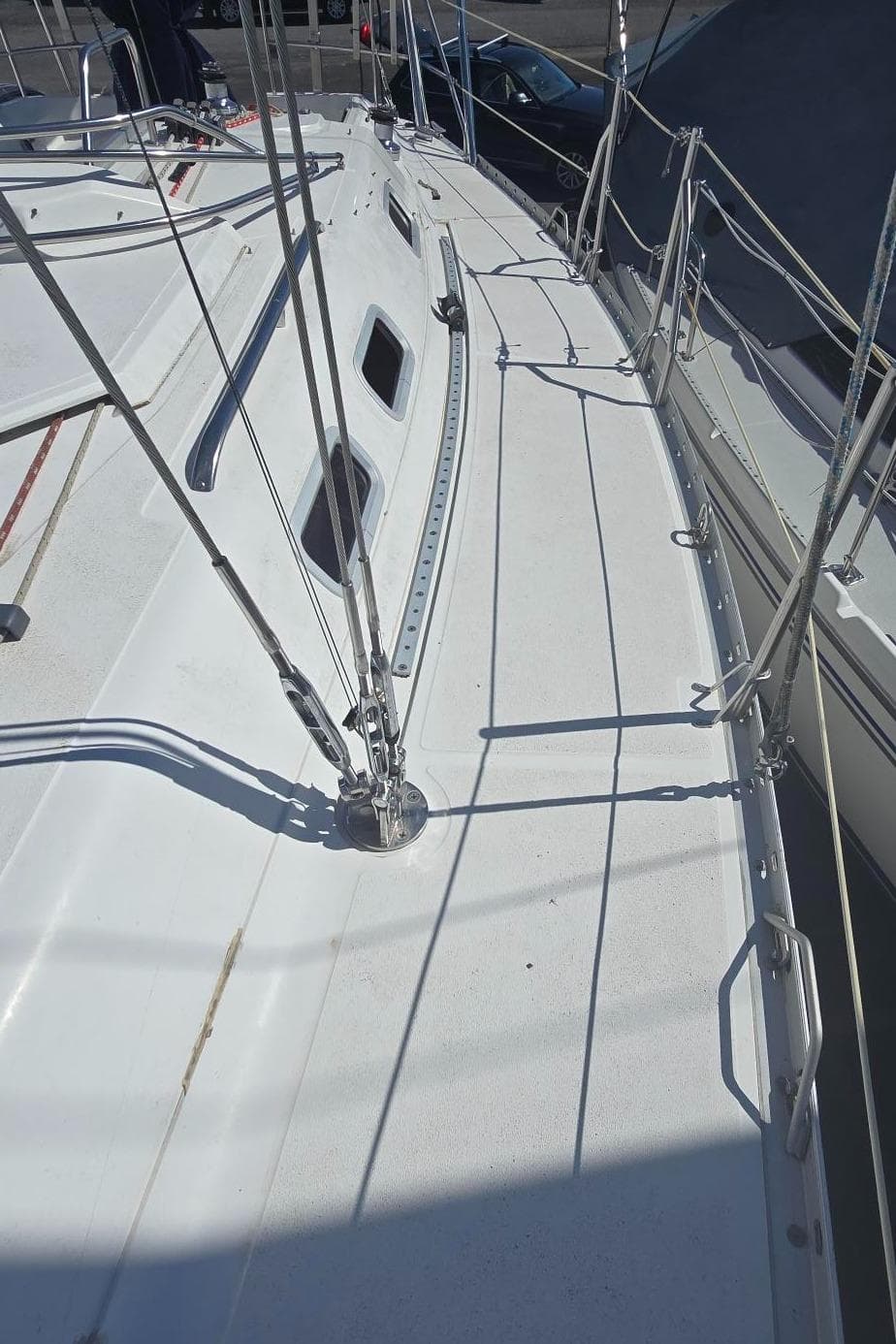 1988 Hunter Legend 37 sailboat deck with rigging and railings.