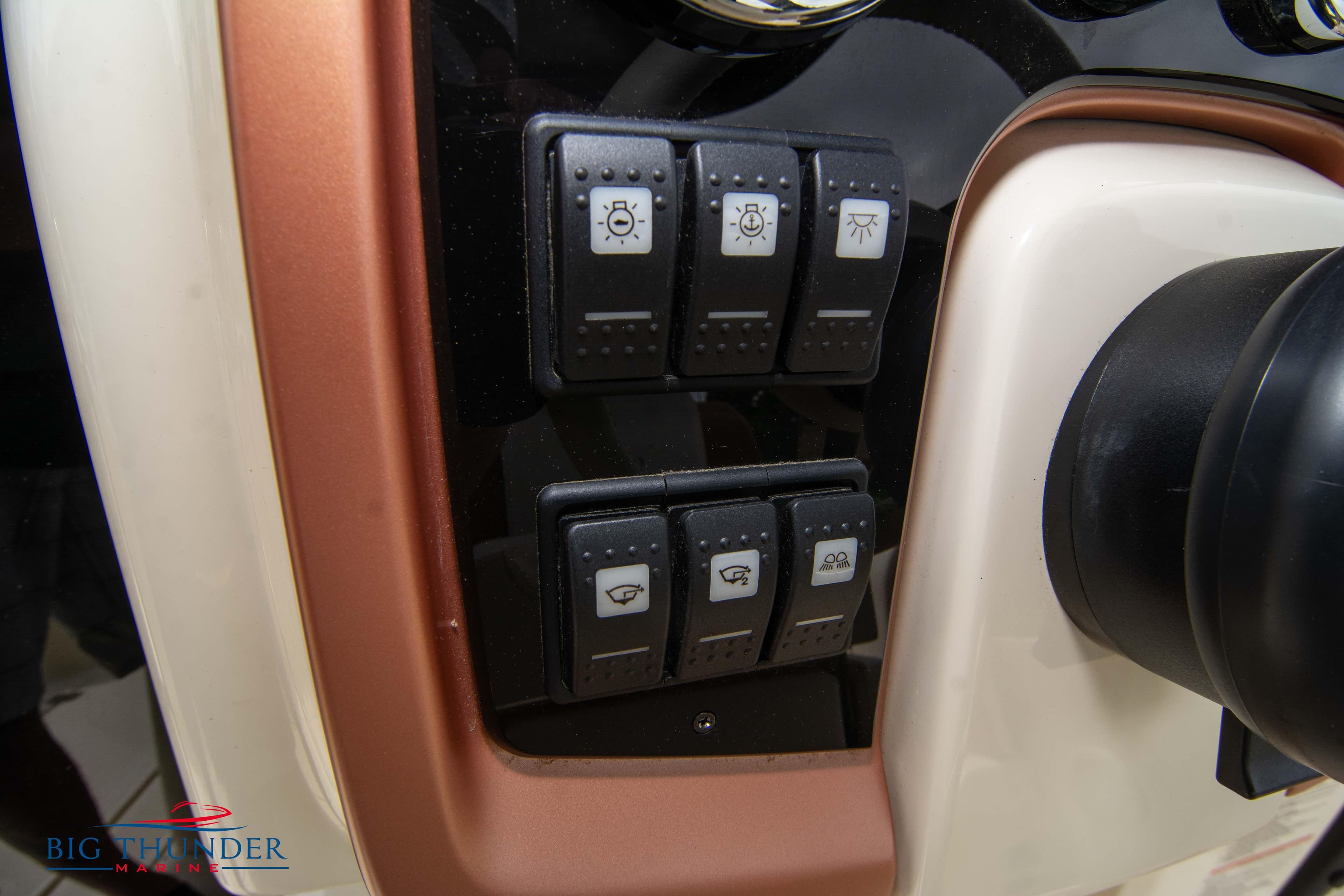 Control panel of 2024 Capoforte CX280i boat with various switches.