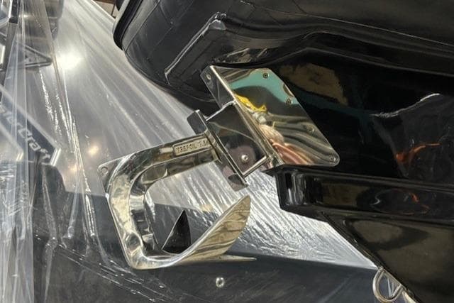 2018 Lomac Gran Turismo 10.5 boat detail with polished metal anchor.