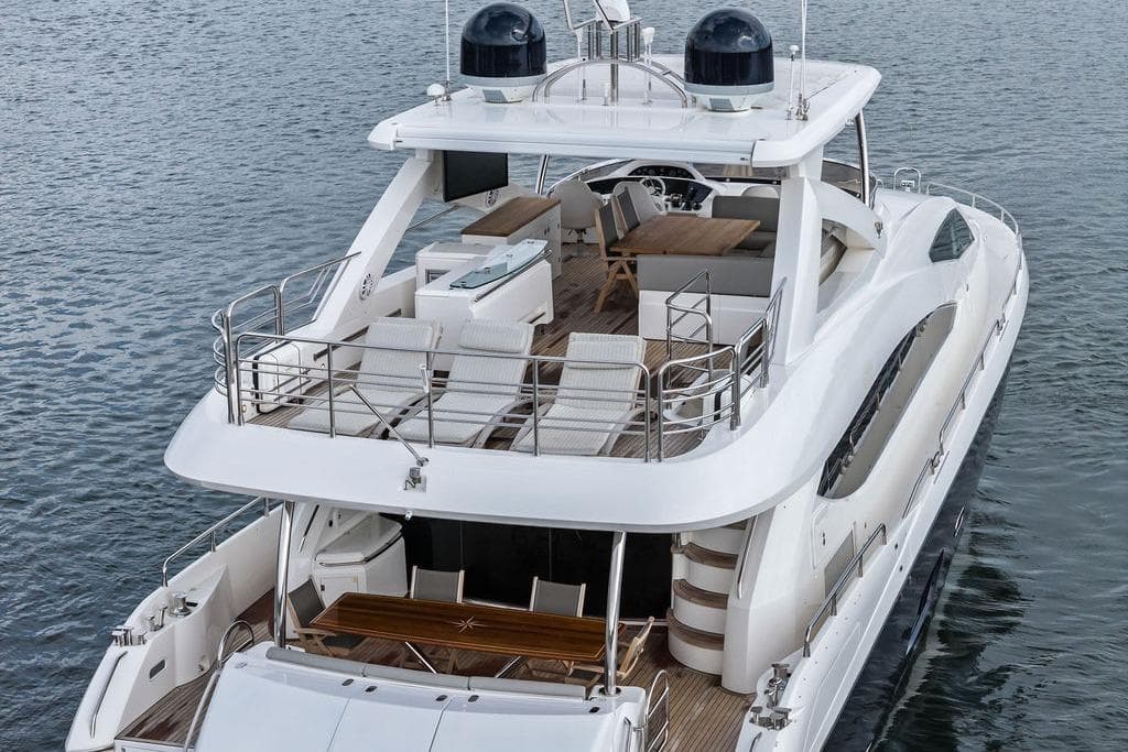 Luxurious 2012 Sunseeker 88 Yacht with spacious deck and elegant design on the water.