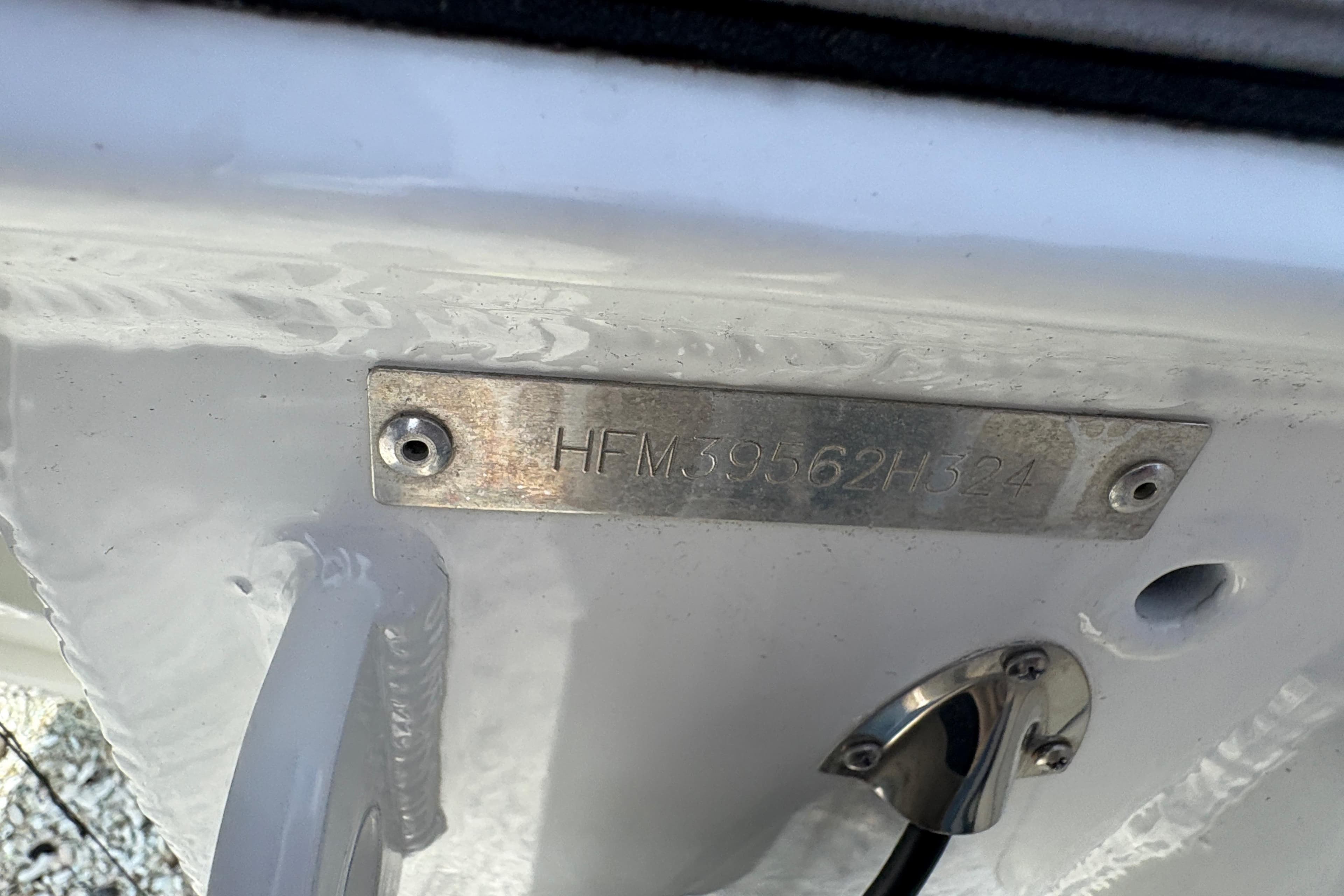 2024 Highfield Sport 360 boat hull identification number plate.