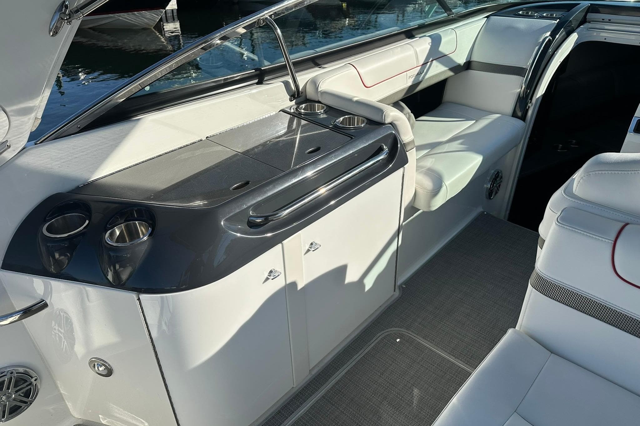 Interior of a 2018 Formula 290 Sun Sport boat with sleek seating and modern amenities.