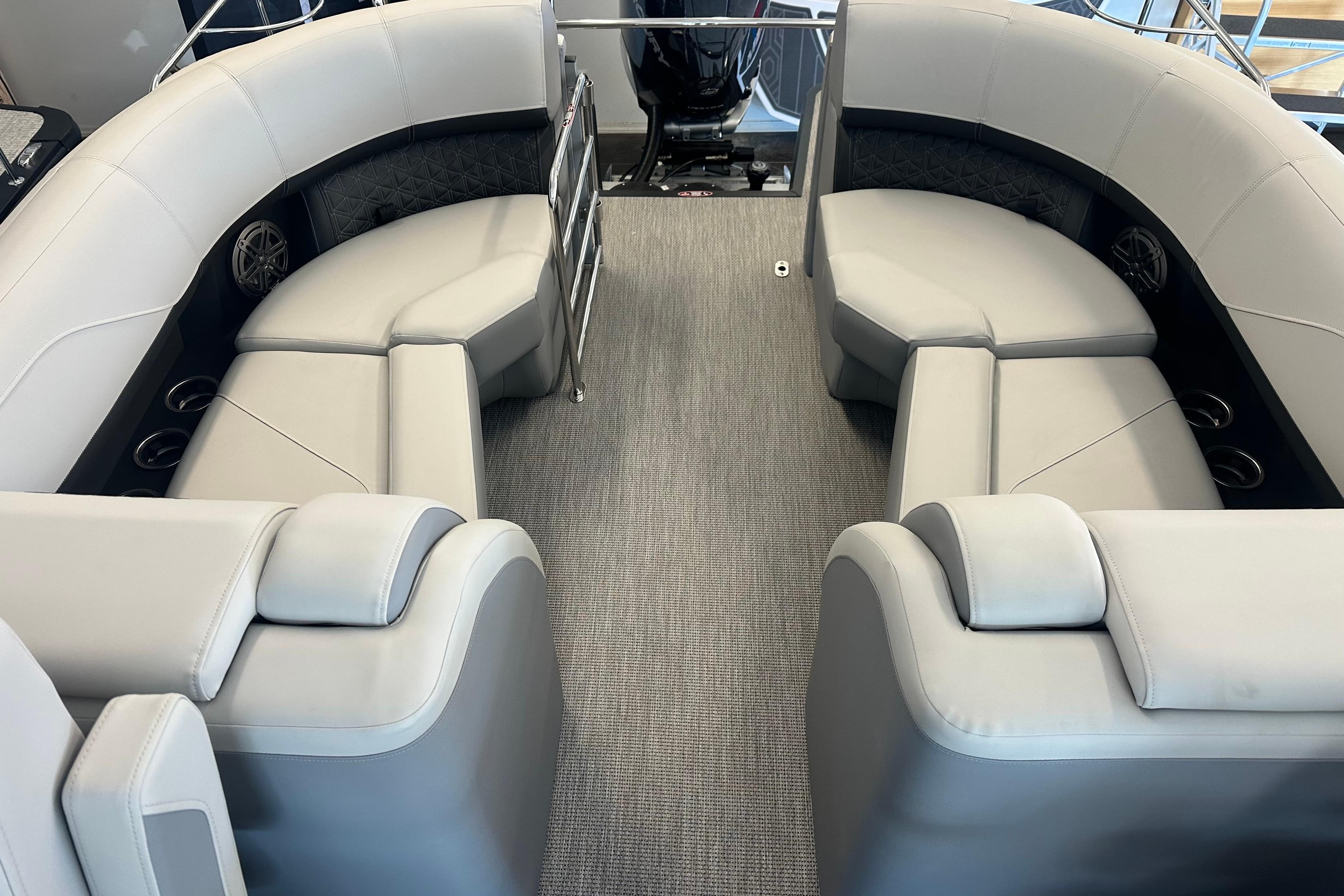Luxurious seating on 2026 Harris Solstice 230 CWDH pontoon boat, featuring elegant gray upholstery.